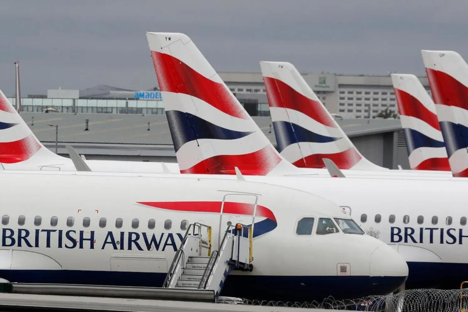 FILE - British Airways planes parked at Terminal 5 Heathrow airport in London, Wednesday, March 18, 2020. (AP Photo/Frank Augstein, File) THE ASSOCIATED PRESS

