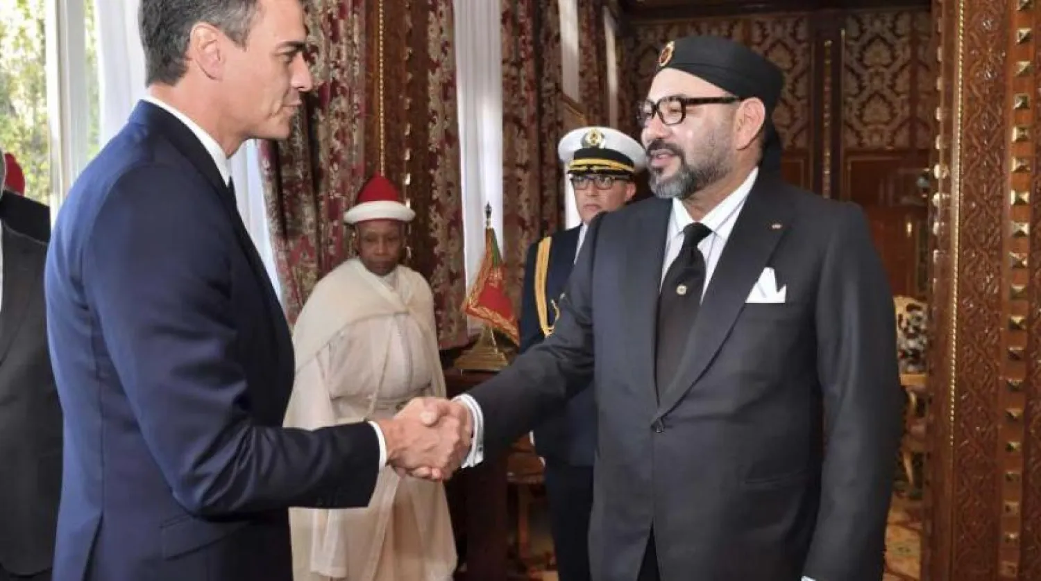 A file picture shows Moroccan King Mohammed VI welcoming Spanish Prime Minister Pedro Sanchez, prior to their meeting at the Royal Palace in Rabat, November 19, 2018. (AP)
