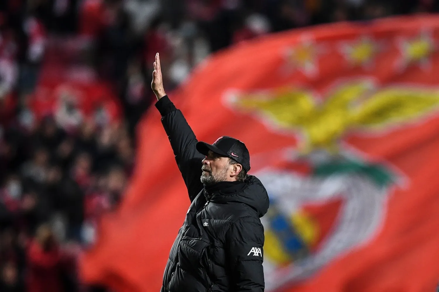 Liverpool's German manager Jurgen Klopp celebrates at the end of the UEFA Champions League quarter final first leg football match between SL Benfica and Liverpool FC at the Luz stadium in Lisbon on April 5, 2022. (AFP)
