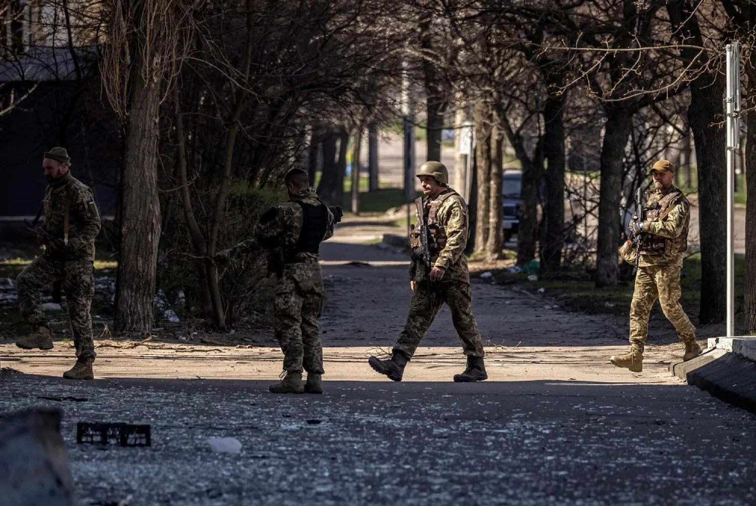 Ukrainian soldiers walk in the city of Severodonetsk, Donbas region, on April 7, 2022, amid Russia's military invasion launched on Ukraine. (AFP)