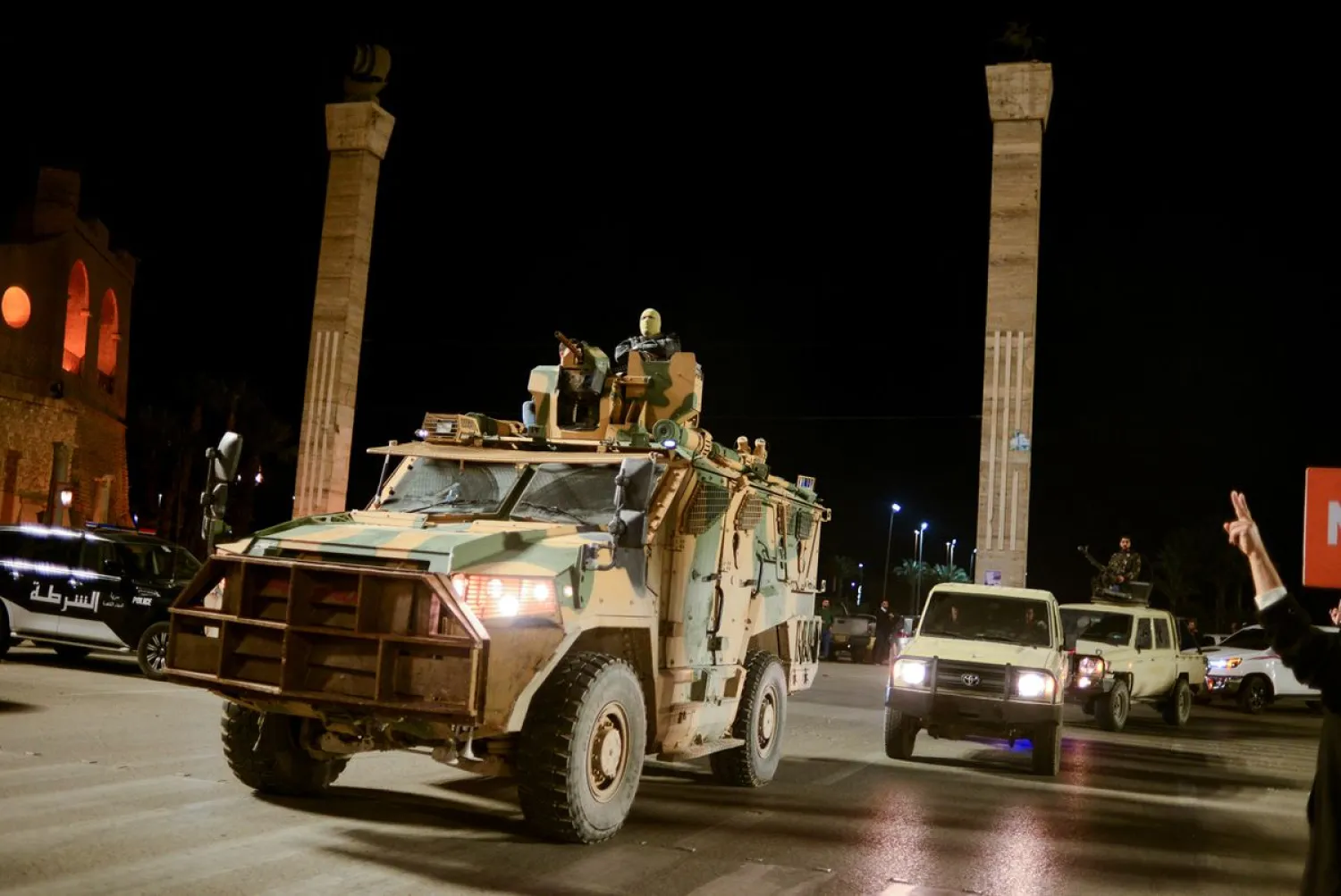Members of the military personnel arrive to take part in a parade calling for parliamentary and presidential election, at Martyr's square in Tripoli, Libya February 12, 2022. REUTERS/Nada Harib

