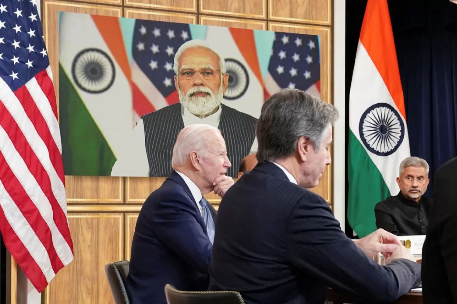US President Joe Biden, seated with US Secretary of State Antony Blinken and India's Foreign Minister Subrahmanyam Jaishankar, holds a videoconference with India's Prime Minister Narendra Modi to discuss Russia's war with Ukraine from the White House in Washington US, April 11, 2022. (Reuters)
