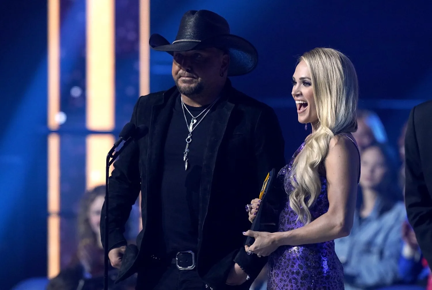 Jason Aldean, left, and Carrie Underwood accept the award for collaborative video of the year for "If I Didn't Love You" at the CMT Music Awards on Monday, April 11, 2022, at the Municipal Auditorium in Nashville, Tenn. (AP)