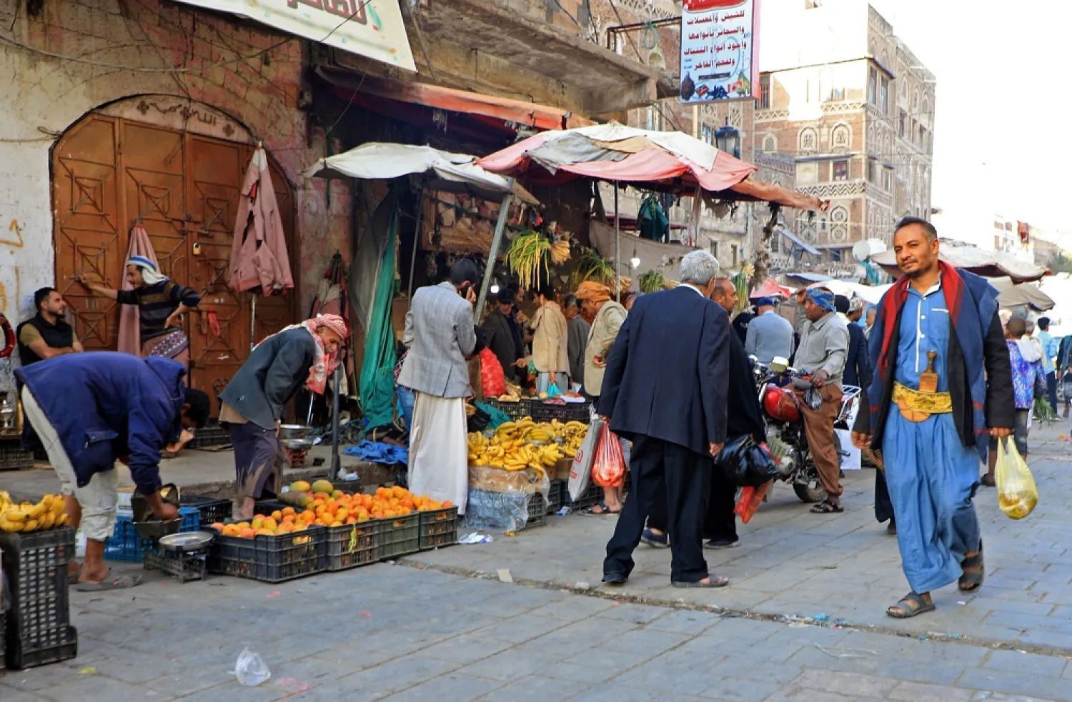 Yemenis shop at a market during the Muslim holy fasting month of Ramadan, in the capital Sanaa on April 6, 2022. (AFP)