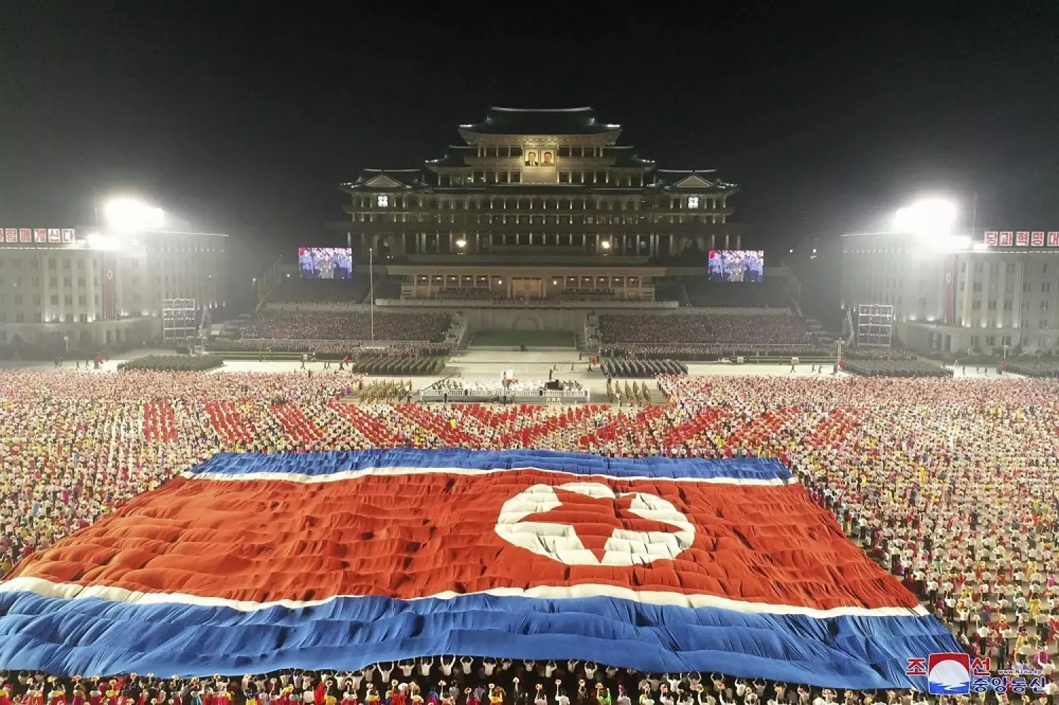 A huge North Korea flag is displayed in Kim Il Sung Square in Pyongyang on Sept. 9, 2021. (KCNA/Reuters)