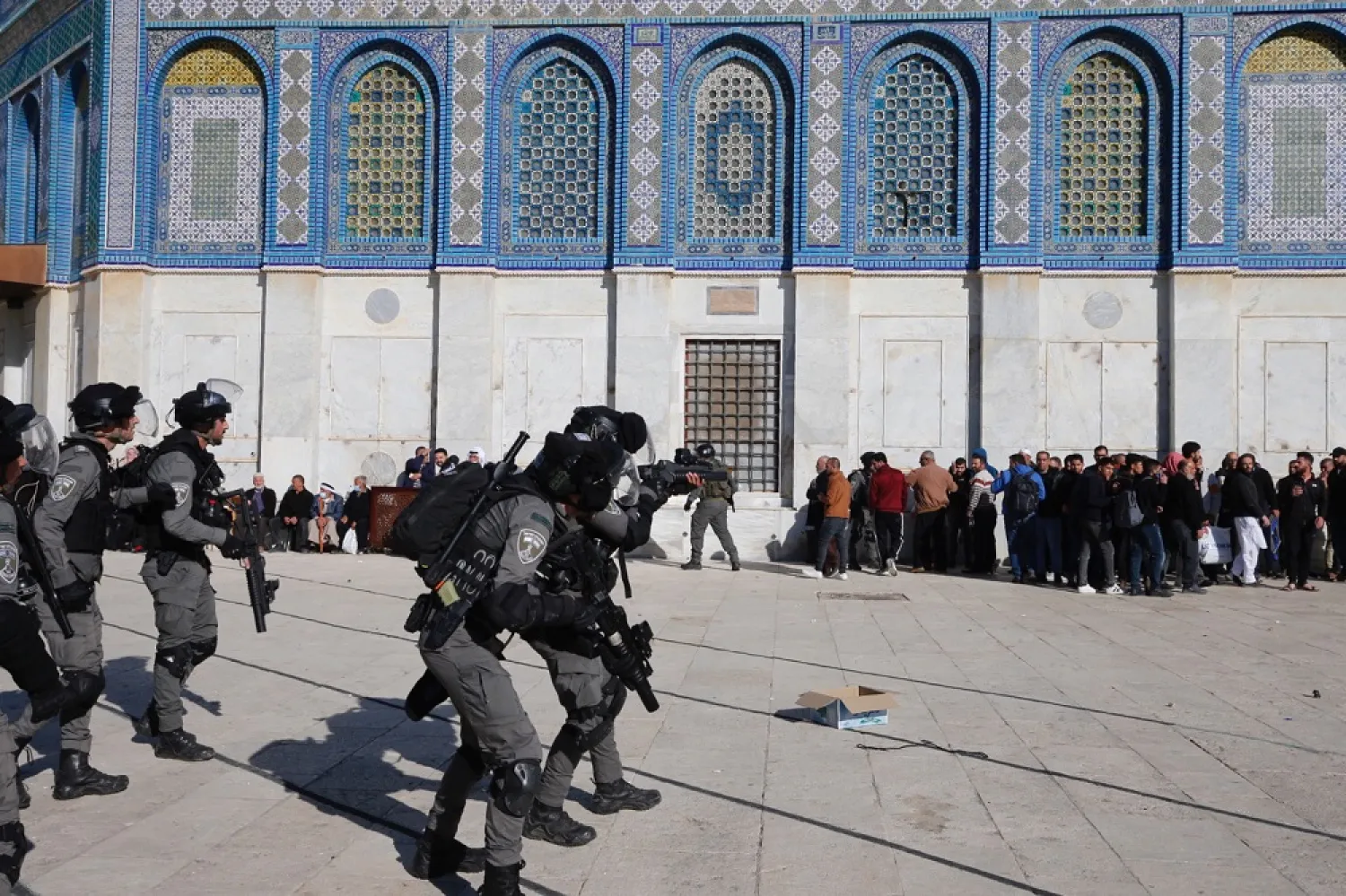 Israeli police clashes with Palestinians inside Al-Aqsa Mosque compound after Israeli police entered the compound before dawn as thousands of Muslims were gathered to perform prayers during the holy month of Ramadan, Jerusalem, 15 April 2022. (EPA)