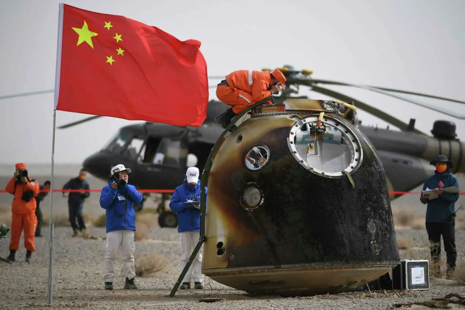 In this photo released by China's Xinhua News Agency, the return capsule of the Shenzhou-13 manned space mission is seen after landing at the Dongfeng landing site in northern China's Inner Mongolia Autonomous Region, Saturday, April 16, 2022. (Peng Yuan/Xinhua via AP)Peng Yuan/AP
