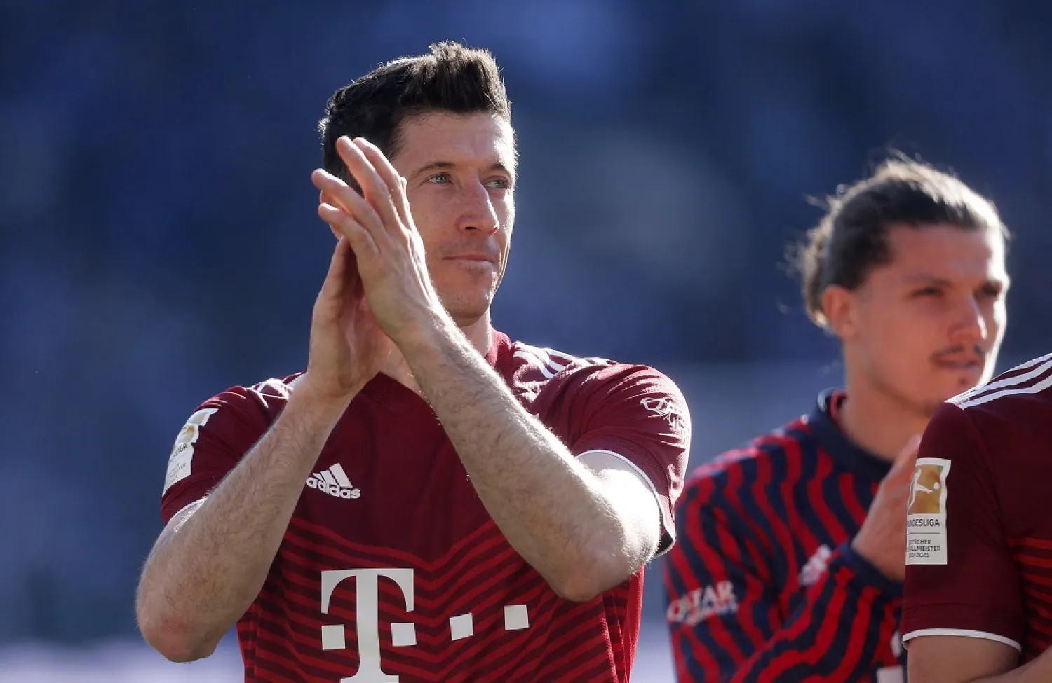 Football - Bundesliga - Arminia Bielefeld v Bayern Munich - Bielefelder Alm, Bielefeld, Germany - April 17, 2022 Bayern Munich's Robert Lewandowski applauds fans after the match. (Reuters)