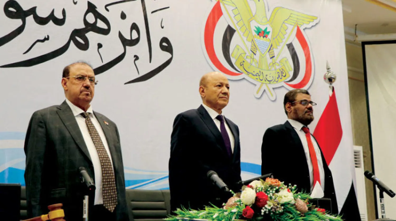 رئيس المجلس الرئاسي رشاد العليمي خلال جلسة أداء القسم أمس (رويترز)