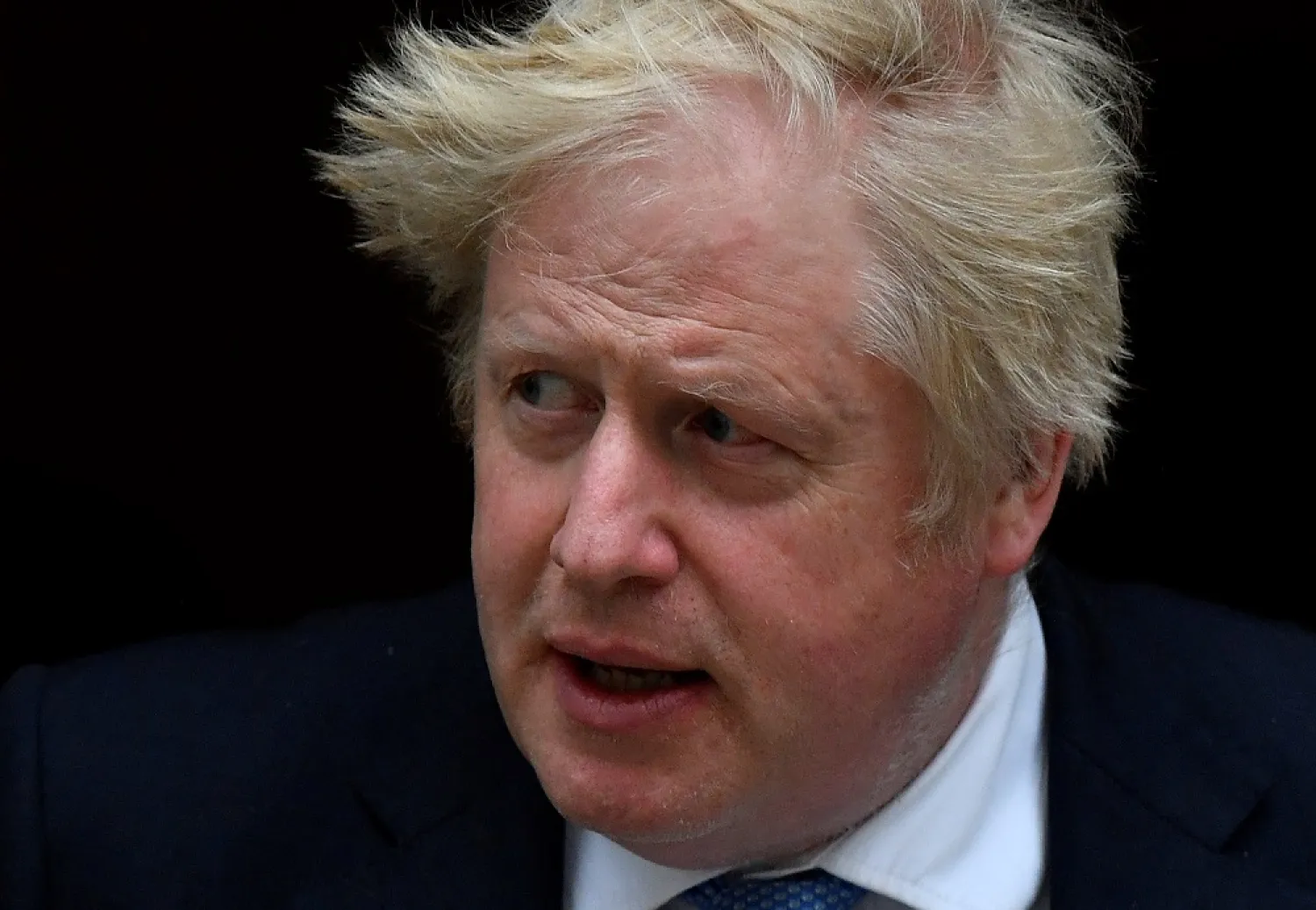 British Prime Minister Boris Johnson departs Downing Street to deliver a statement at the Houses of Parliament, London, Britain, April 19, 2022. (Reuters)