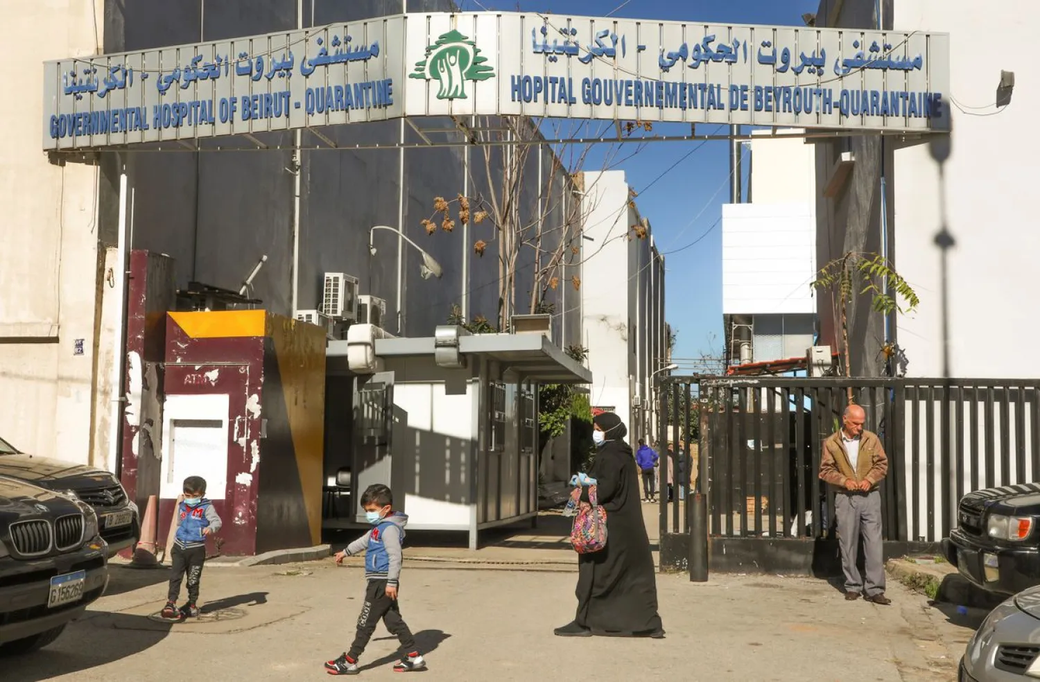People walk outside the Karantina Governmental Hospital in Beirut, Lebanon January 17, 2022. REUTERS/Mohamed Azakir

