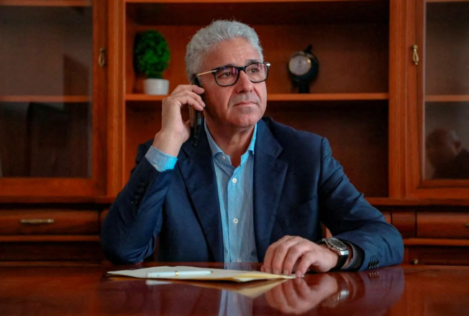 Fathi Bashagha, designated as prime minister by the parliament, looks on during an interview over the phone with Reuters, in Tobruk, Libya March 2, 2022. Picture taken March 2, 2022. Media office of the new government/via REUTERS /File Photo

