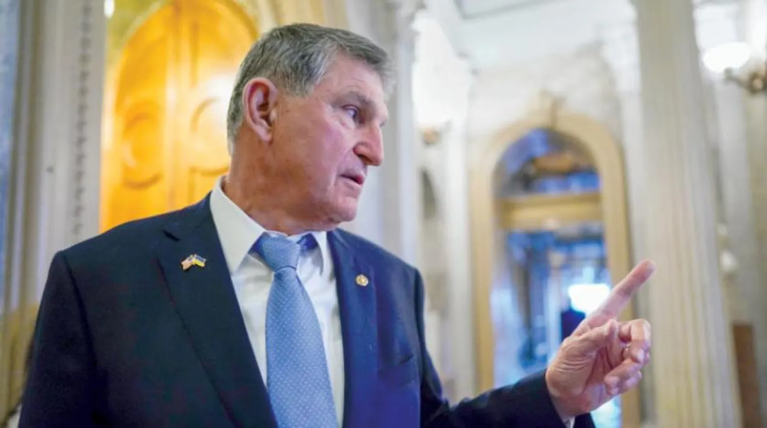 US Senator Joe Manchin speaks to the press in Washington (AP)