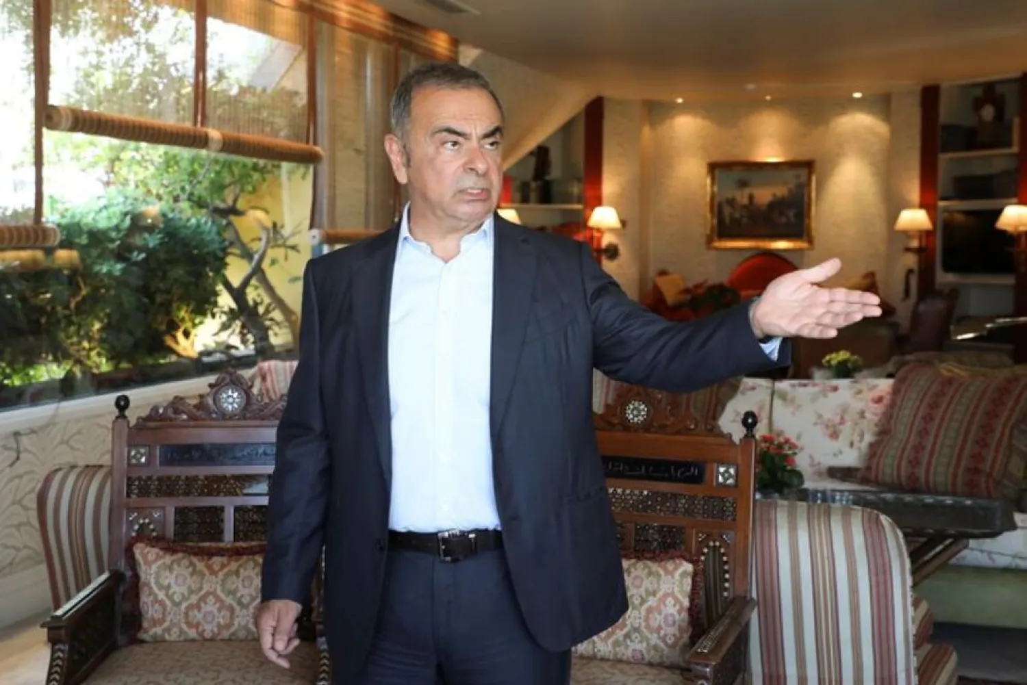 Fugitive former car executive Carlos Ghosn, gestures before an interview with Reuters in Beirut, Lebanon June 14, 2021. (Reuters)