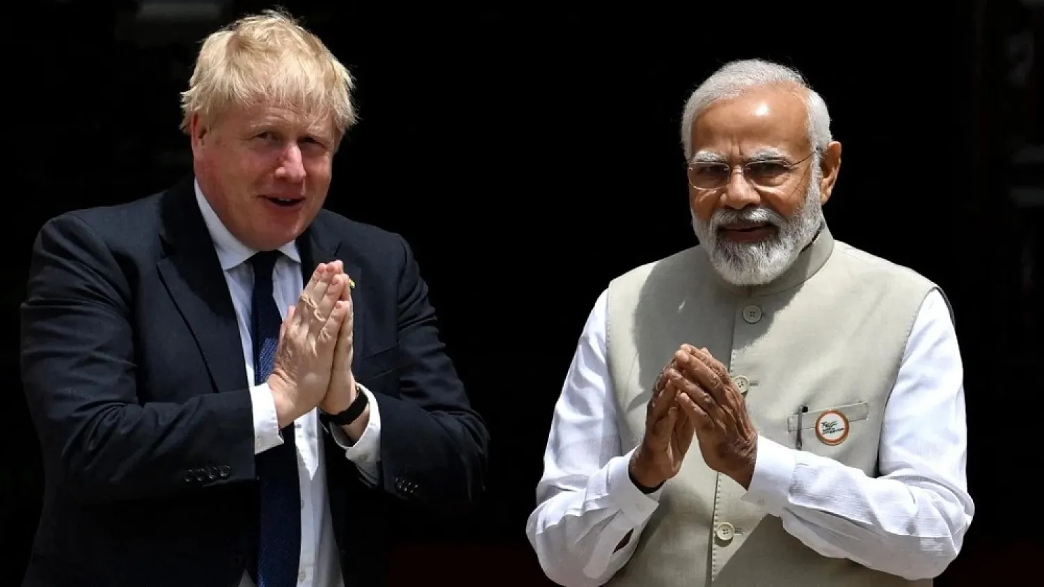 Britain's Prime Minister Boris Johnson and his Indian counterpart Narendra Modi meet at Hyderabad House in New Delhi on April 22, 2022. (AFP)