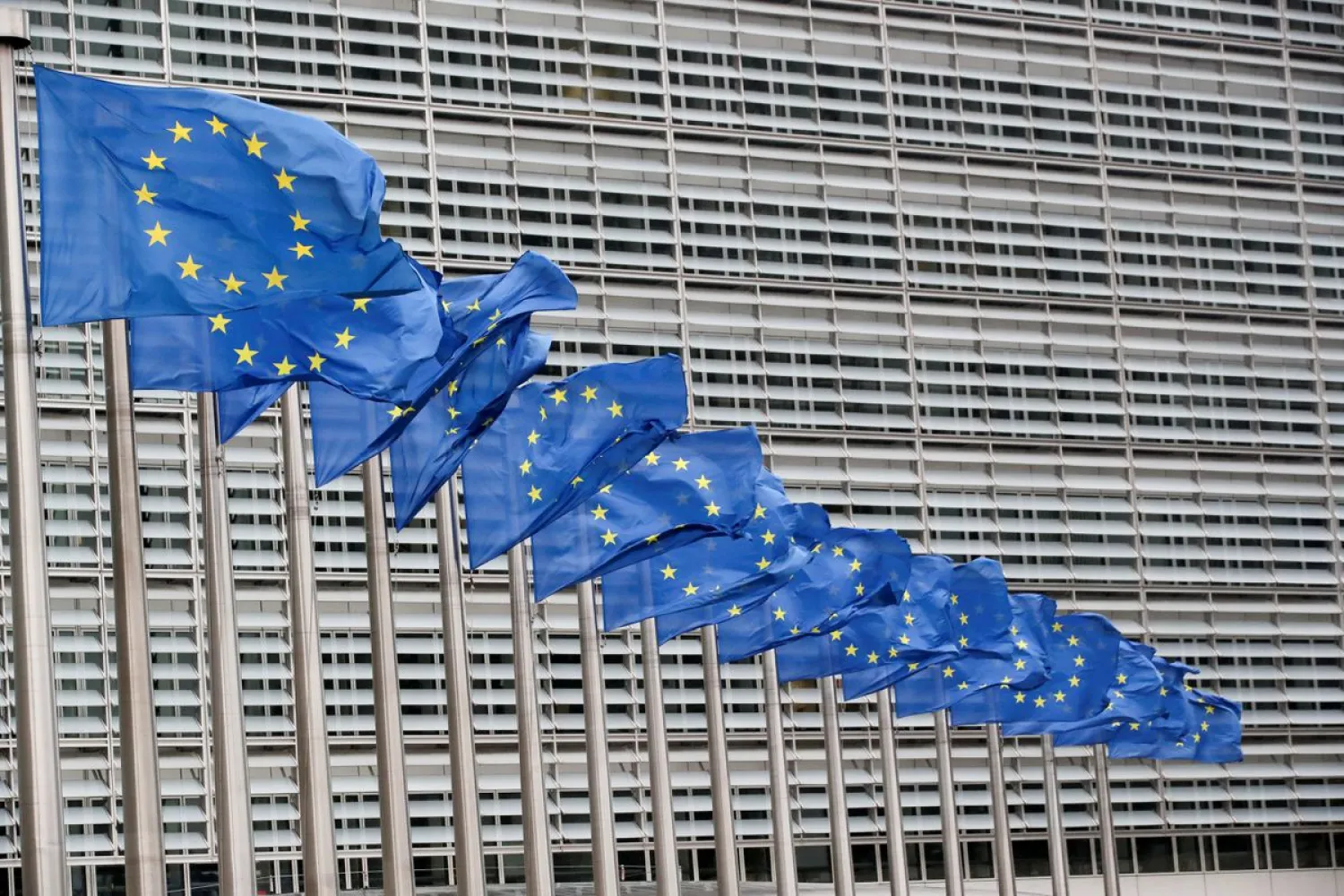 European Union flags flutter outside the EU Commission headquarters in Brussels, Belgium, July 14, 2021. (Reuters)
