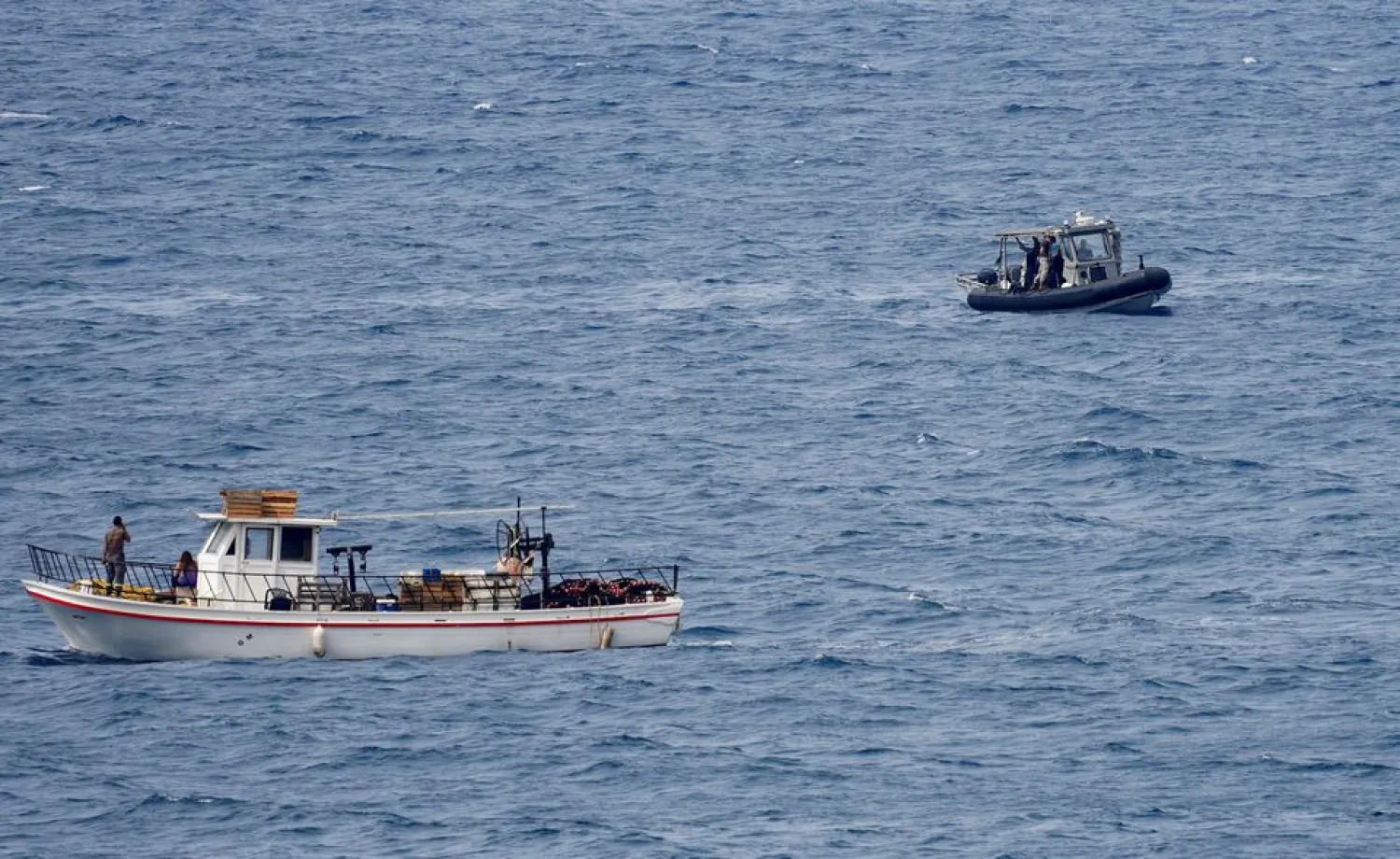 A fishing boat is pictured in the Mediterranean Sea, in Halat, north of Beirut, Lebanon October 13, 2021. REUTERS/Issam Abdallah