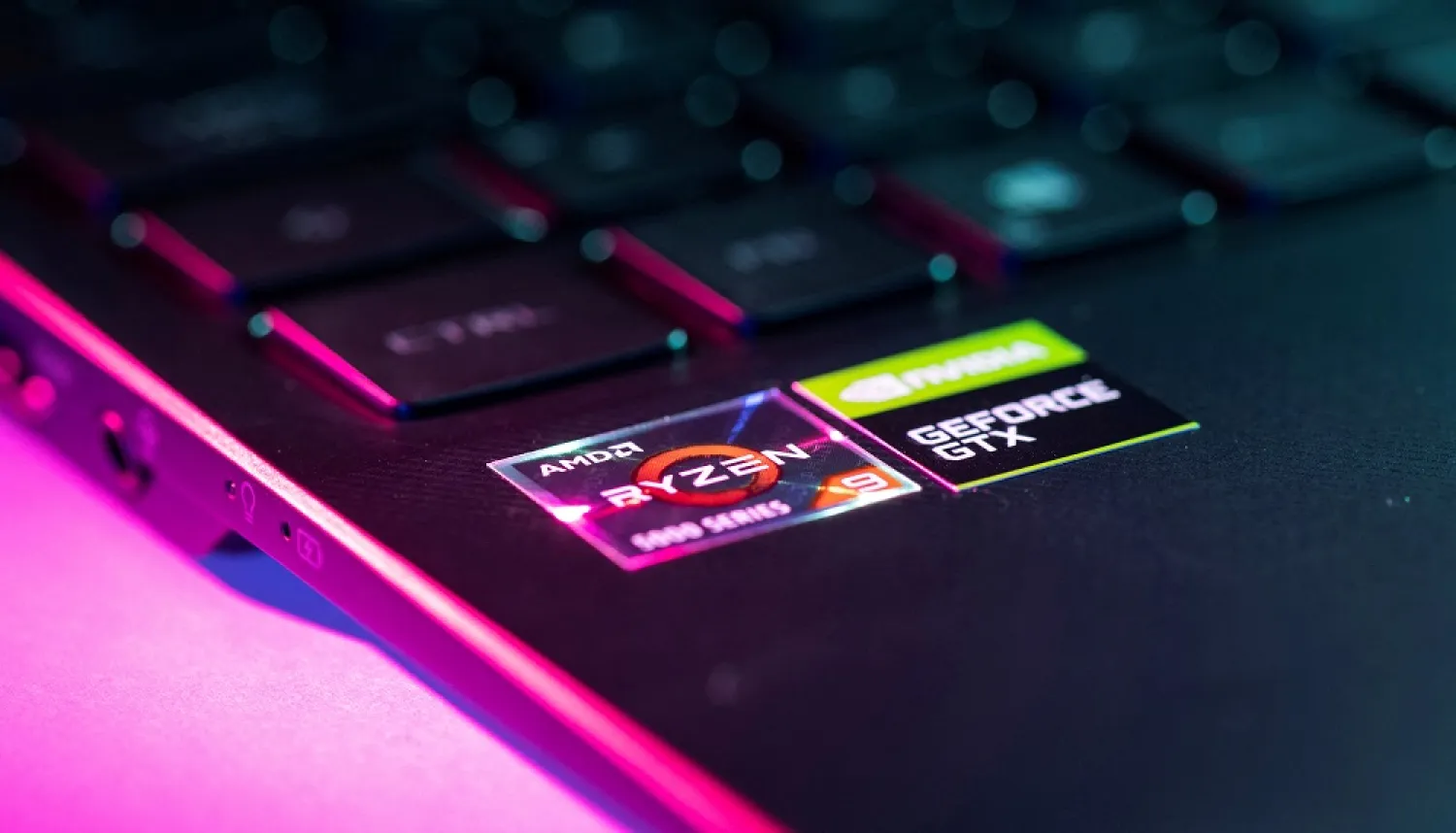 AMD and NVIDIA GeForce stickers are seen on laptop in this illustration taken, December 1, 2021. (Reuters)