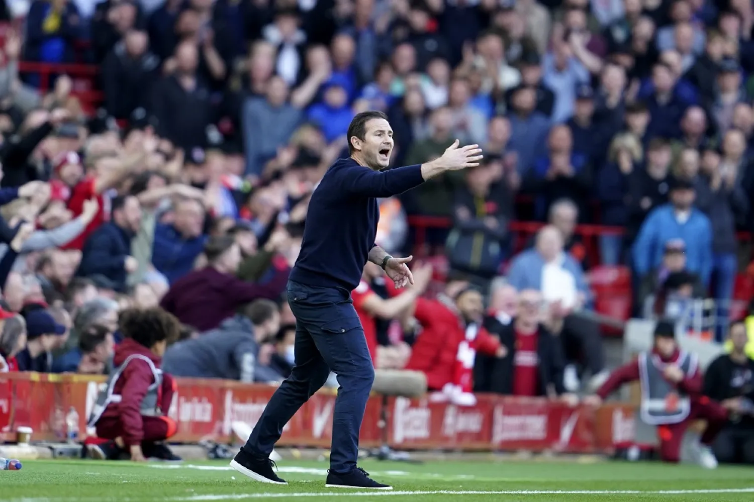 Everton's head coach Frank Lampard gestures during the English Premier League match between Liverpool and Everton at Anfield stadium in Liverpool, England, Sunday, April 24, 2022. (AP)