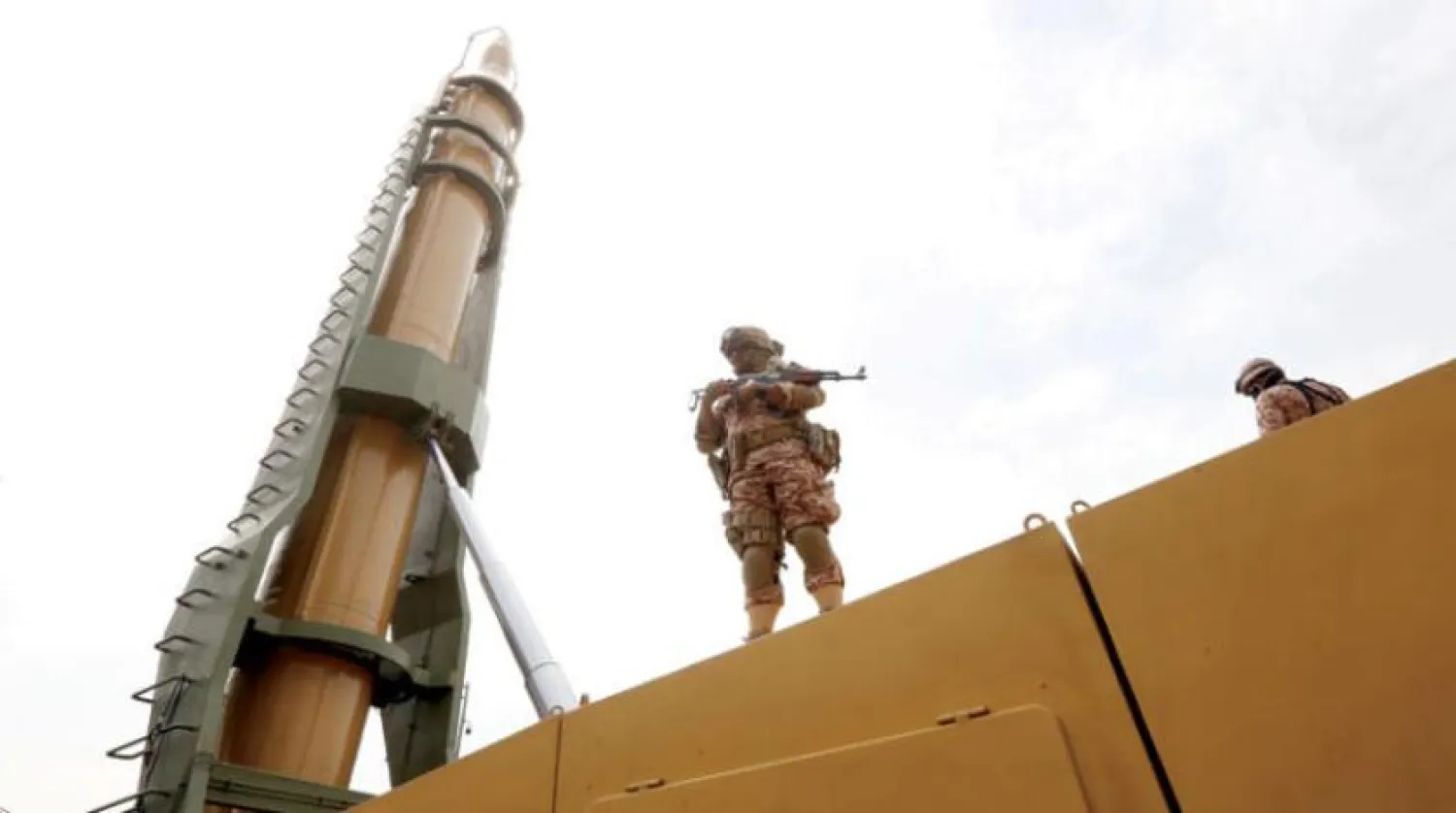 An Iranian soldier stands next to “Shahab-3” missile during a rally marking Jerusalem Day in Tehran, Iran, on April 29, 2022. (EPA) 
