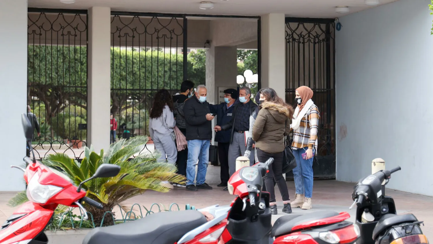 In this file photo taken on January 10, 2022, university students are seen arriving at the campus of the Beirut Arab University in the Lebanese capital. ANWAR AMRO AFP/File
