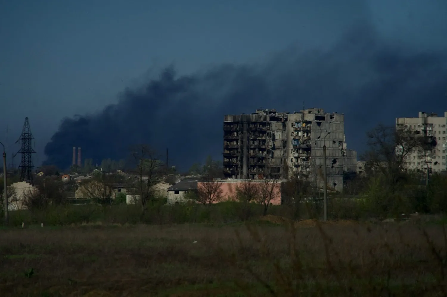 Smoke rises from the grounds of the Azovstal steel plant in the city of Mariupol on April 29, 2022, amid the ongoing Russian military action in Ukraine. (AFP)