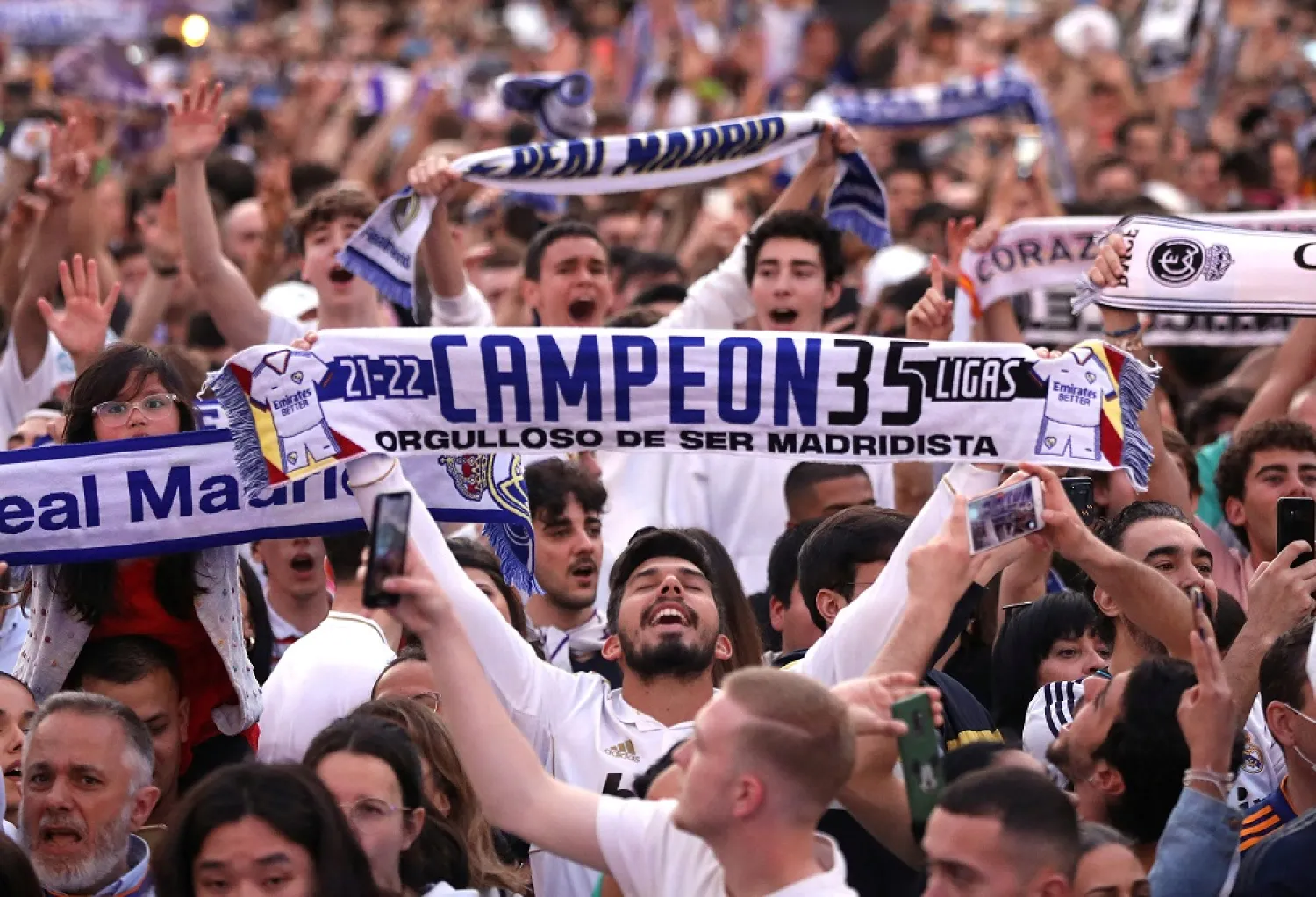 Real Madrid celebrate winning LaLiga - Madrid, Spain - April 30, 2022 Real Madrid fans celebrate winning LaLiga at Cibeles fountain in Madrid. (Reuters)
