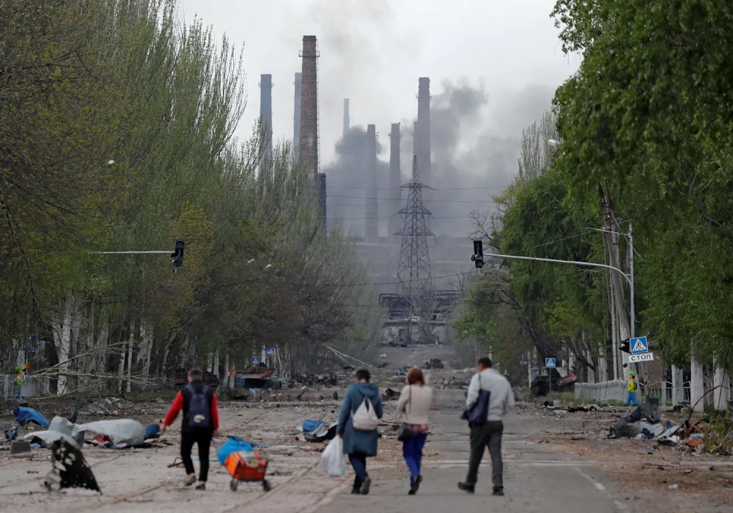 Smoke rises above a plant of Azovstal Iron and Steel Works during Ukraine-Russia conflict in the southern port city of Mariupol, Ukraine May 2, 2022. (Reuters)