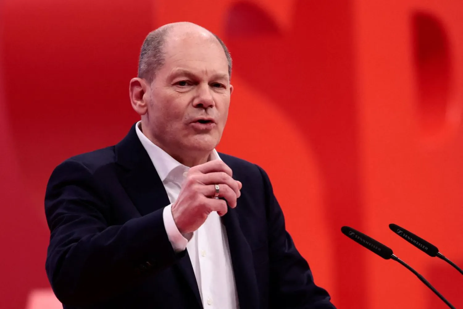 German Chancellor Olaf Scholz speaks during a hybrid party congress of Germany's Social Democratic Party (SPD) in Berlin, Germany, December 11, 2021. REUTERS/Hannibal Hanschke/Pool