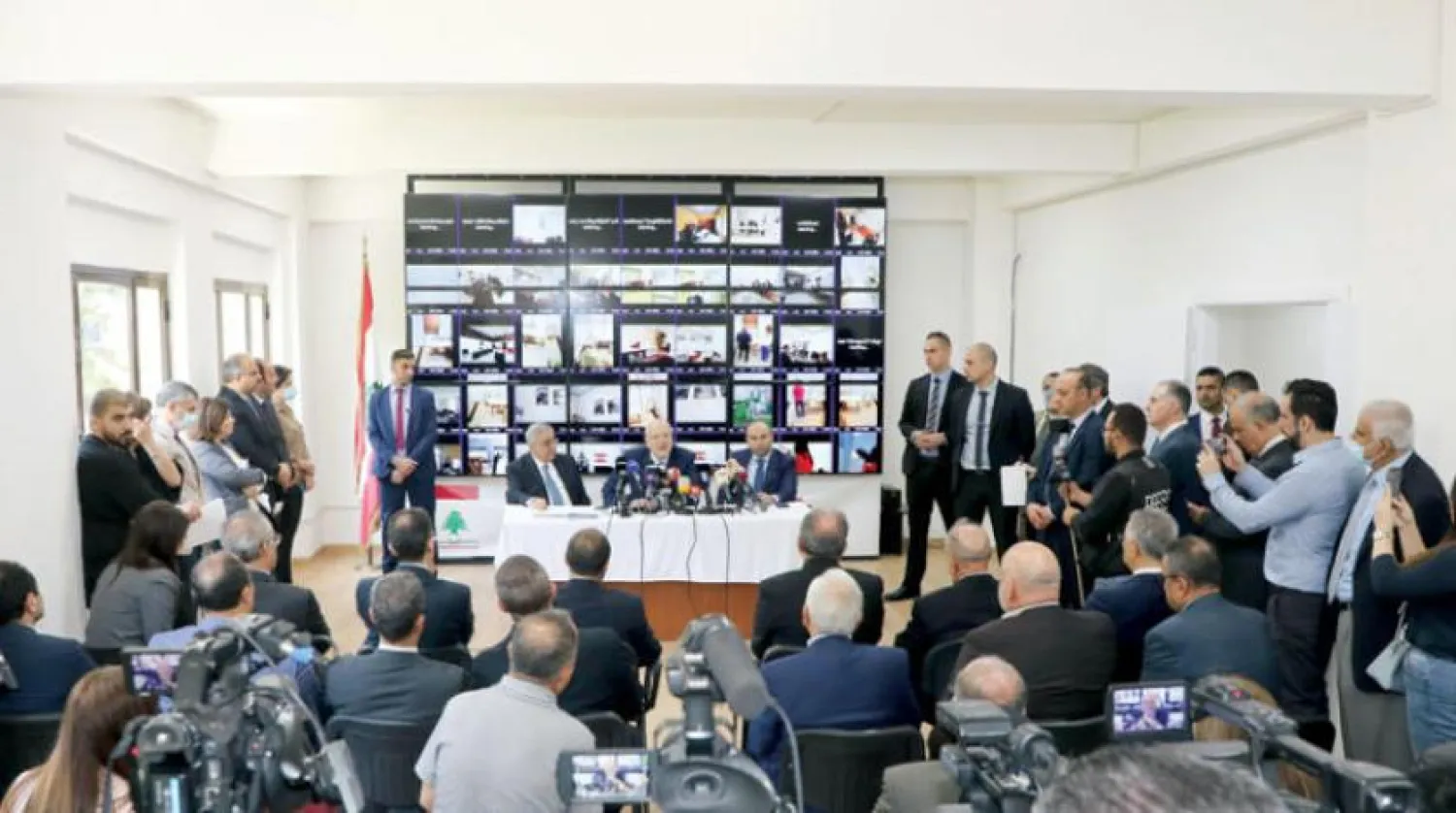 Prime Minister Najib Mikati and Foreign Minister Abdallah Bou Habib during the inauguration of the operations room for managing and monitoring parliamentary elections abroad. (Dalati & Nohra)