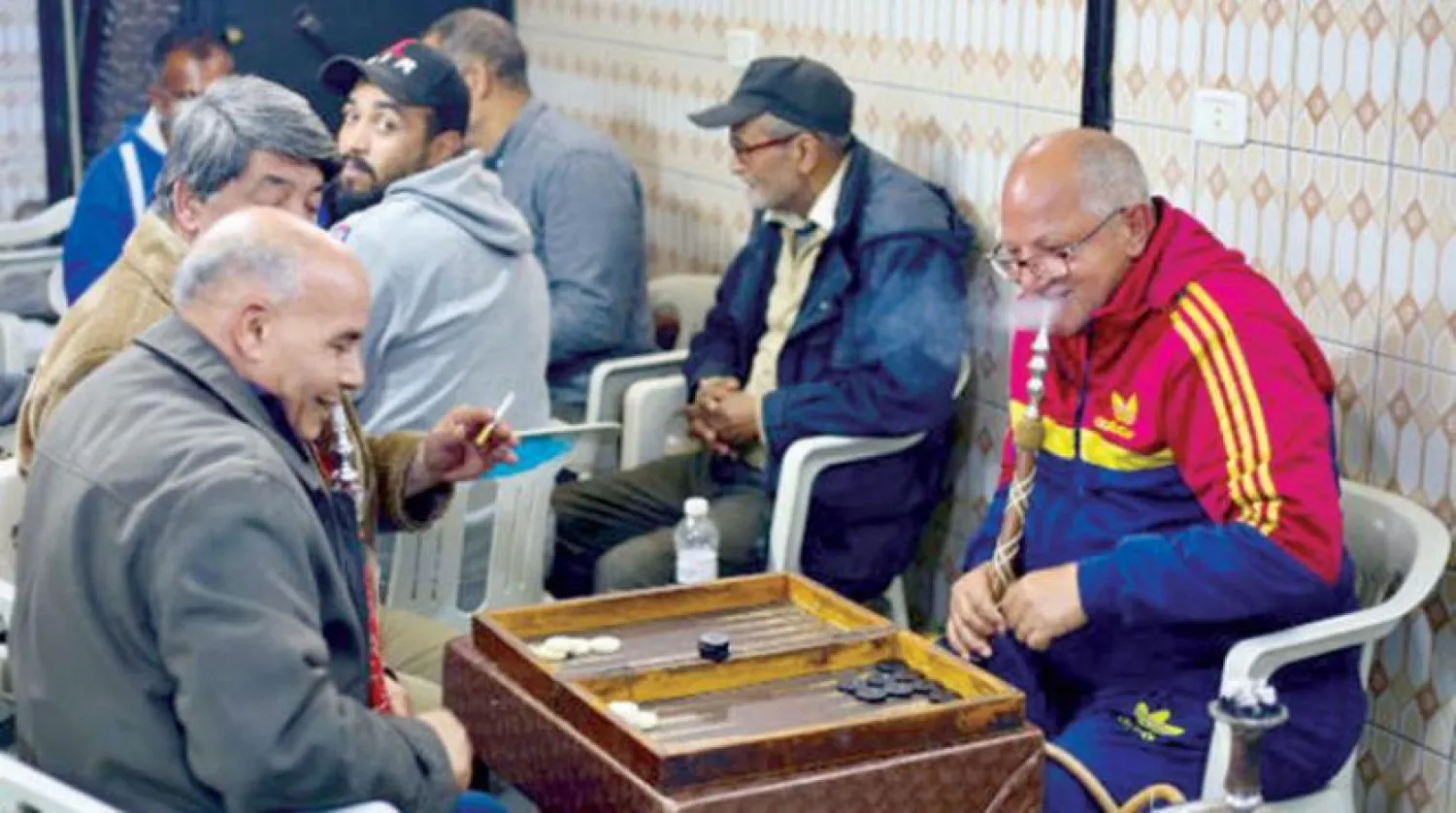 Libyans play backgammon in the old city of Tripoli. (Reuters)