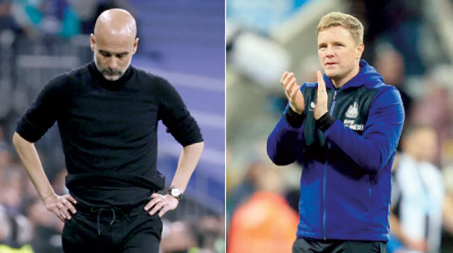 مدرب نيوكاسل إدي هاو  -  مدرب مانشستر سيتي غوارديولا (إ.ب.أ)