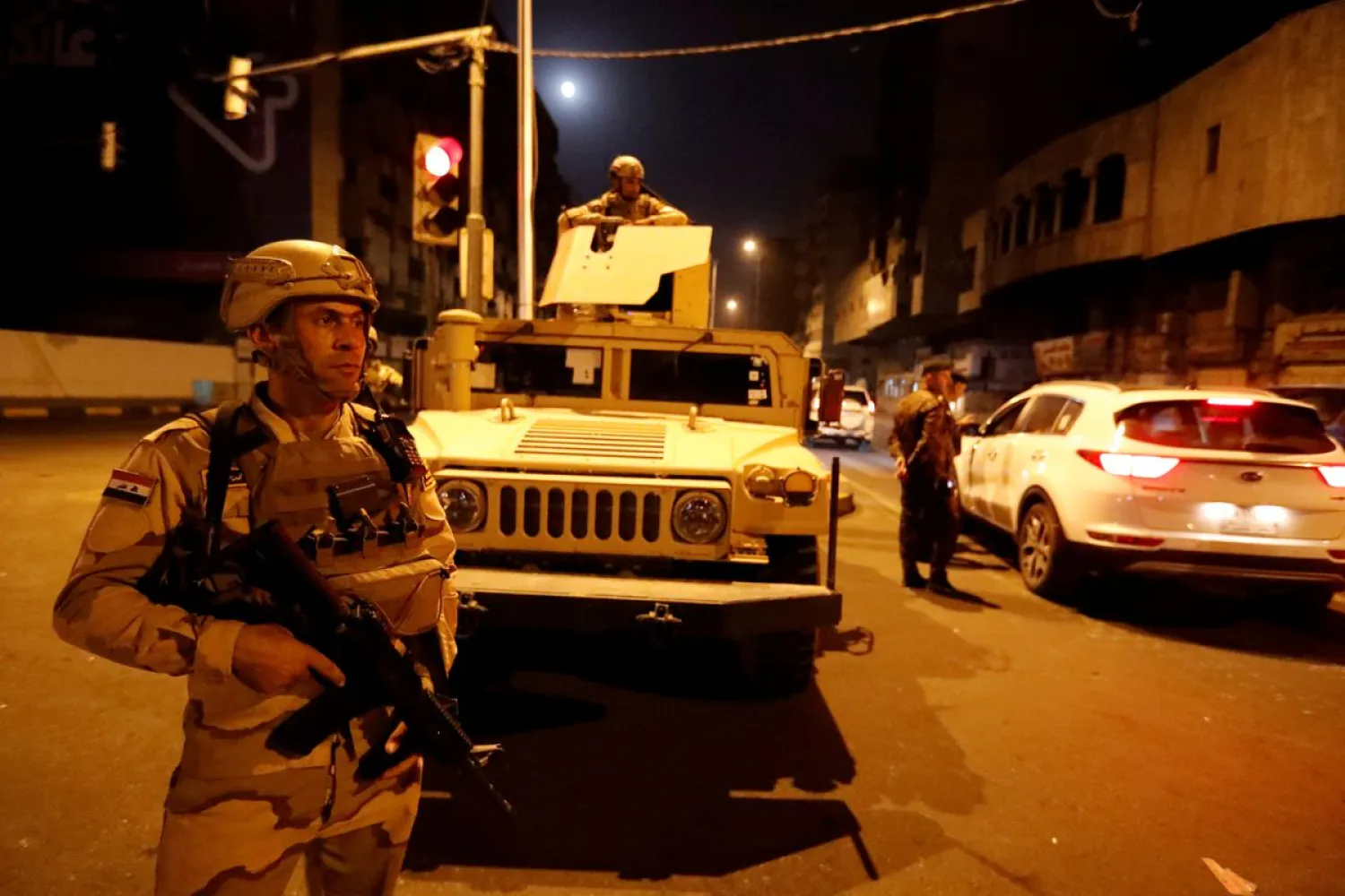 Iraqi soldiers take part in an intensive security deployment in Baghdad, Iraq, May 26, 2021. REUTERS/Thaier Al-Sudani/File Photo

