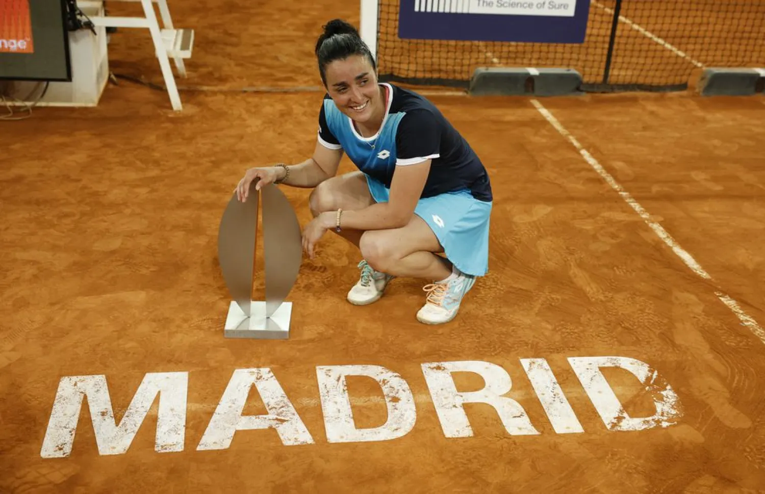 Tennis - WTA Masters 1000 - Madrid Open - Caja Magica, Madrid, Spain - May 7, 2022 Tunisia's Ons Jabeur poses with the trophy after winning the Madrid Open REUTERS/Juan Medina