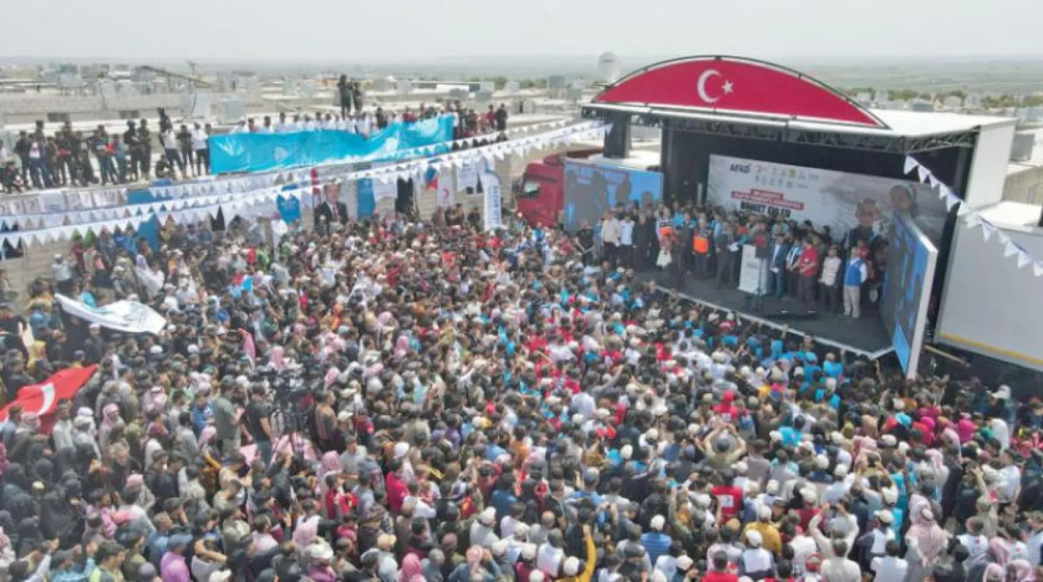 Turkish Interior Minister Suleyman Soylu opening a displacement camp in Idlib (AFP)