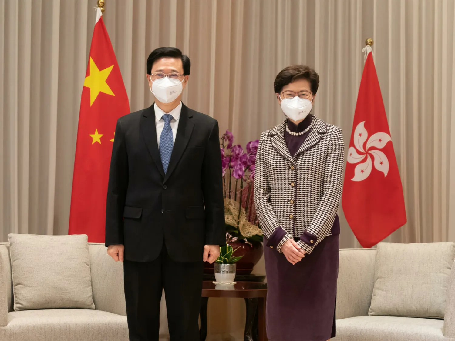 Hong Kong Chief Executive-elect John Lee (L) will take over from Carrie Lam on July 1 Anthony Kwan POOL/AFP
