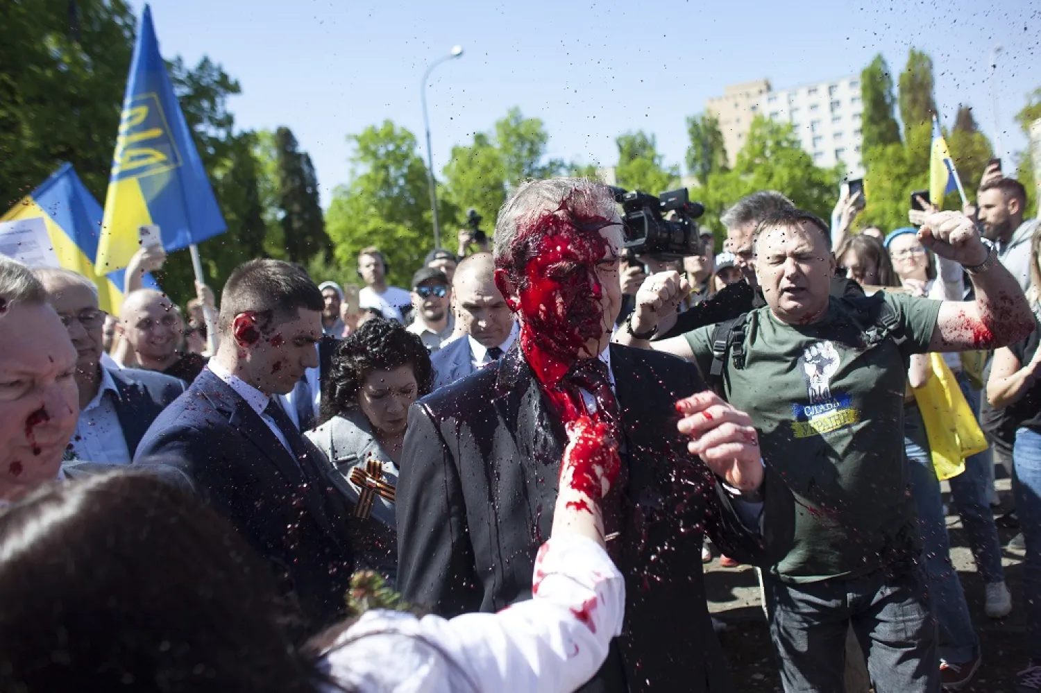 Russian Ambassador to Poland, Ambassador Sergey Andreev is covered with red paint in Warsaw, Poland, Monday, May 9, 2022. (AP)