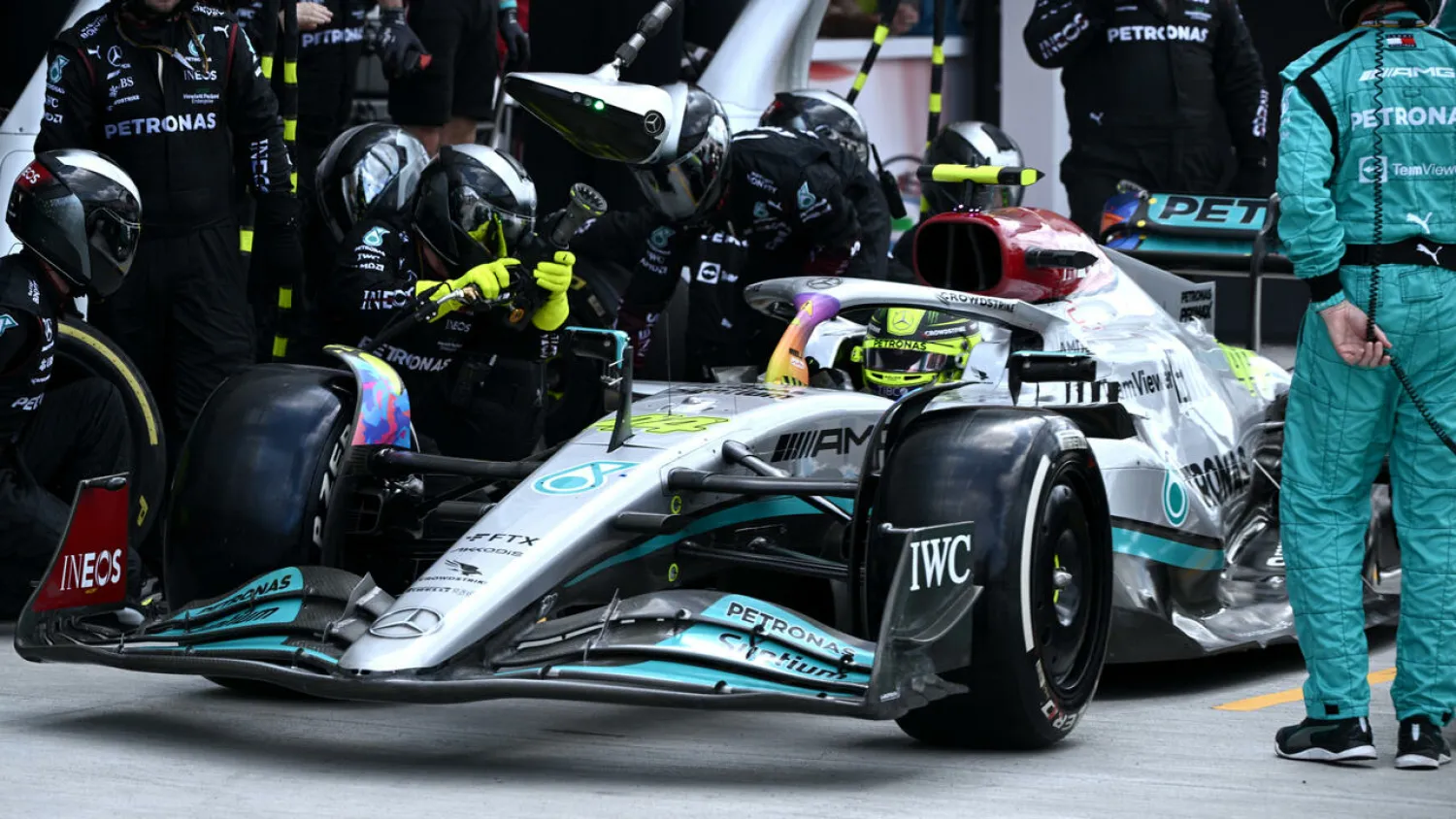Lewis Hamilton said he was surprised his Mercedes team told him it was his choice whether he made a pitstop for fresh tires or not Brendan SMIALOWSKI POOL/AFP
