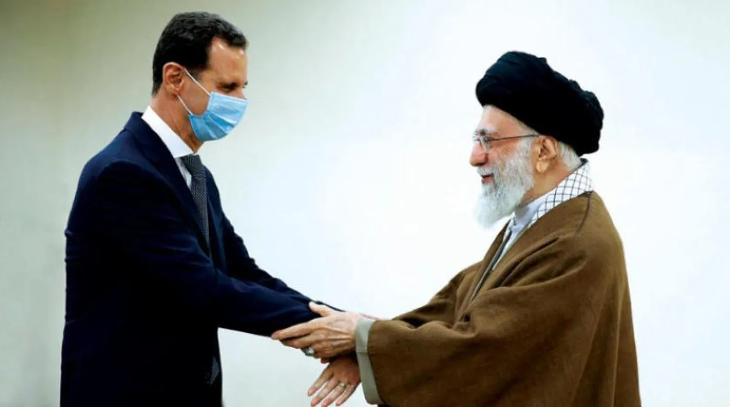 Iranian Supreme Leader Ali Khamenei receives Syrian President Bashar al-Assad in Tehran (AP)