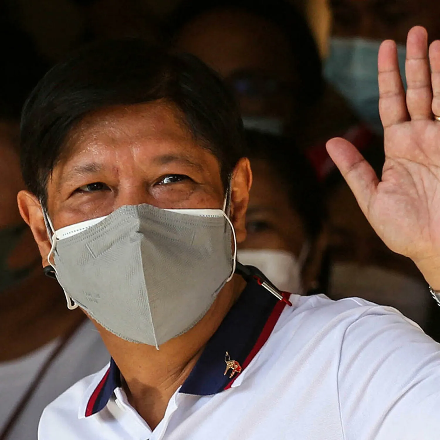 Philippine presidential candidate Ferdinand Marcos Jr waves after casting his vote on May 9, 2022. Jam Sta Rosa, AFP
