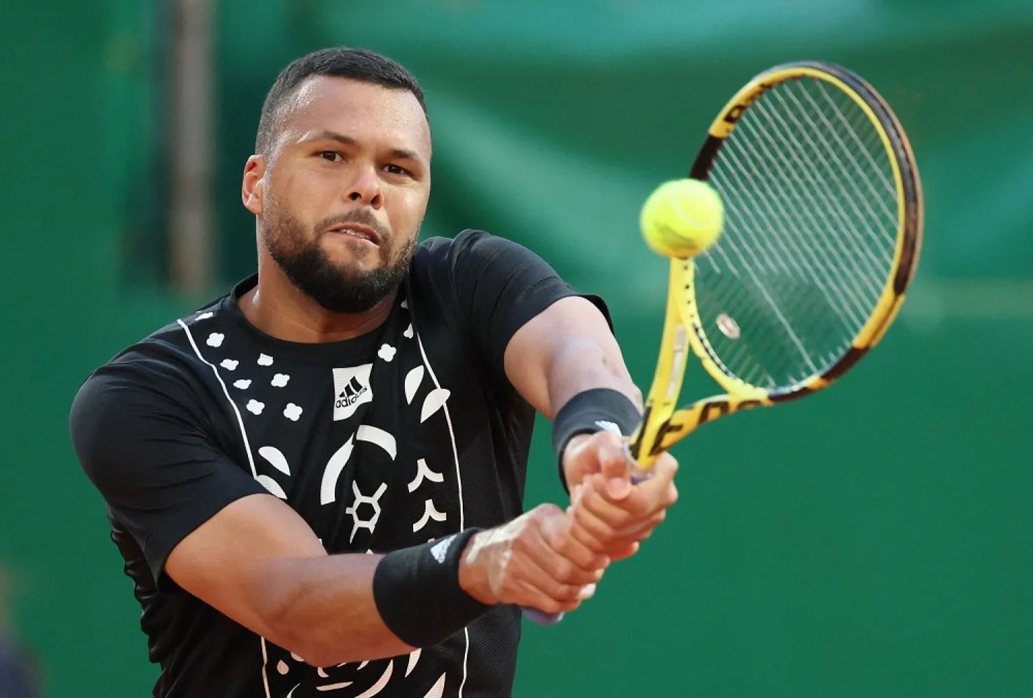 Tennis - ATP Masters 1000 - Monte Carlo Masters - Monte-Carlo Country Club, Roquebrune-Cap-Martin, France - April 11, 2022 France's Jo-Wilfred Tsonga in action during his first round match against Croatia's Marin Cilic. (Reuters)