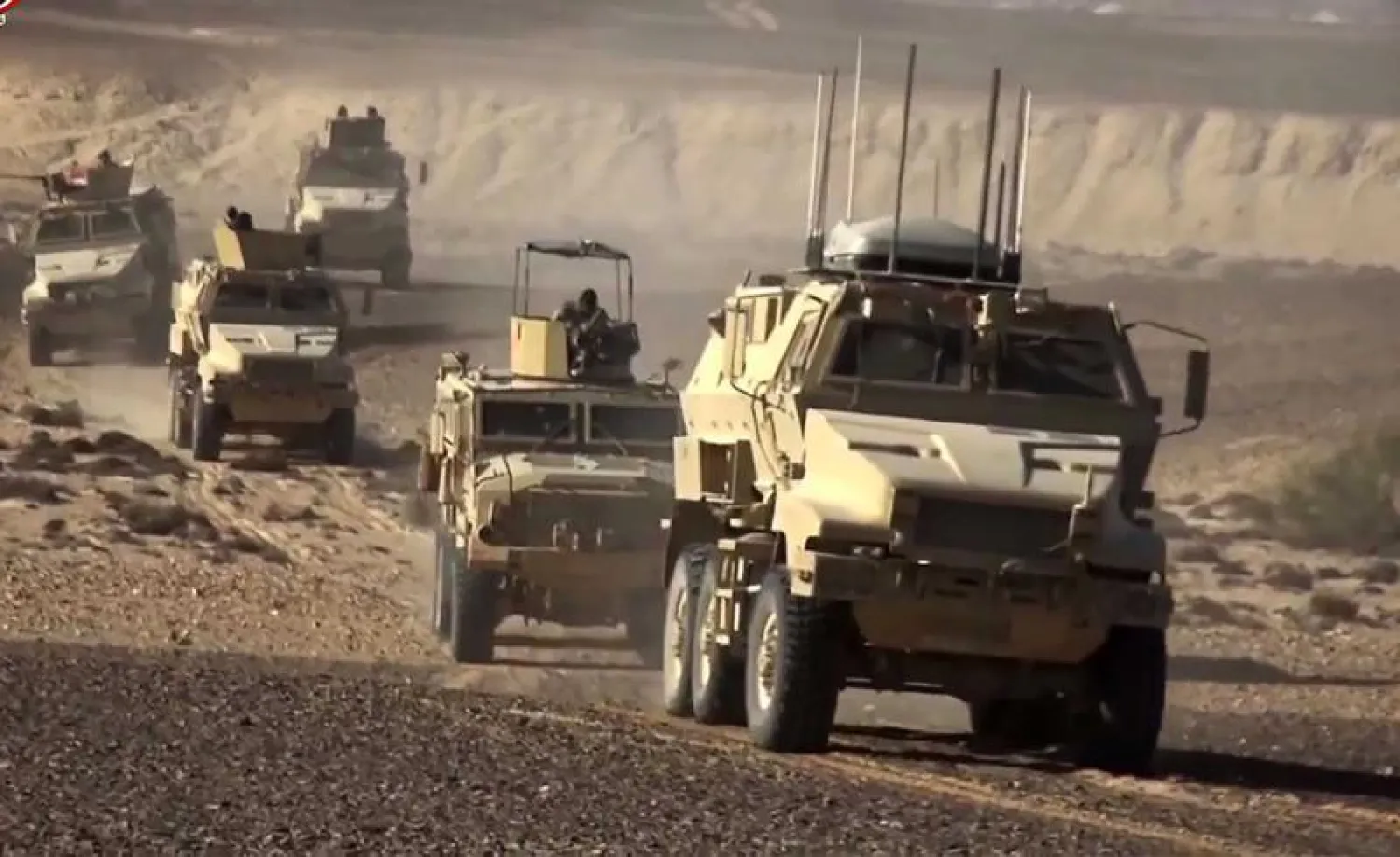 A file picture shows an Egyptian army armored personnel carriers (APCs) driving in the Sinai desert. (AFP)
