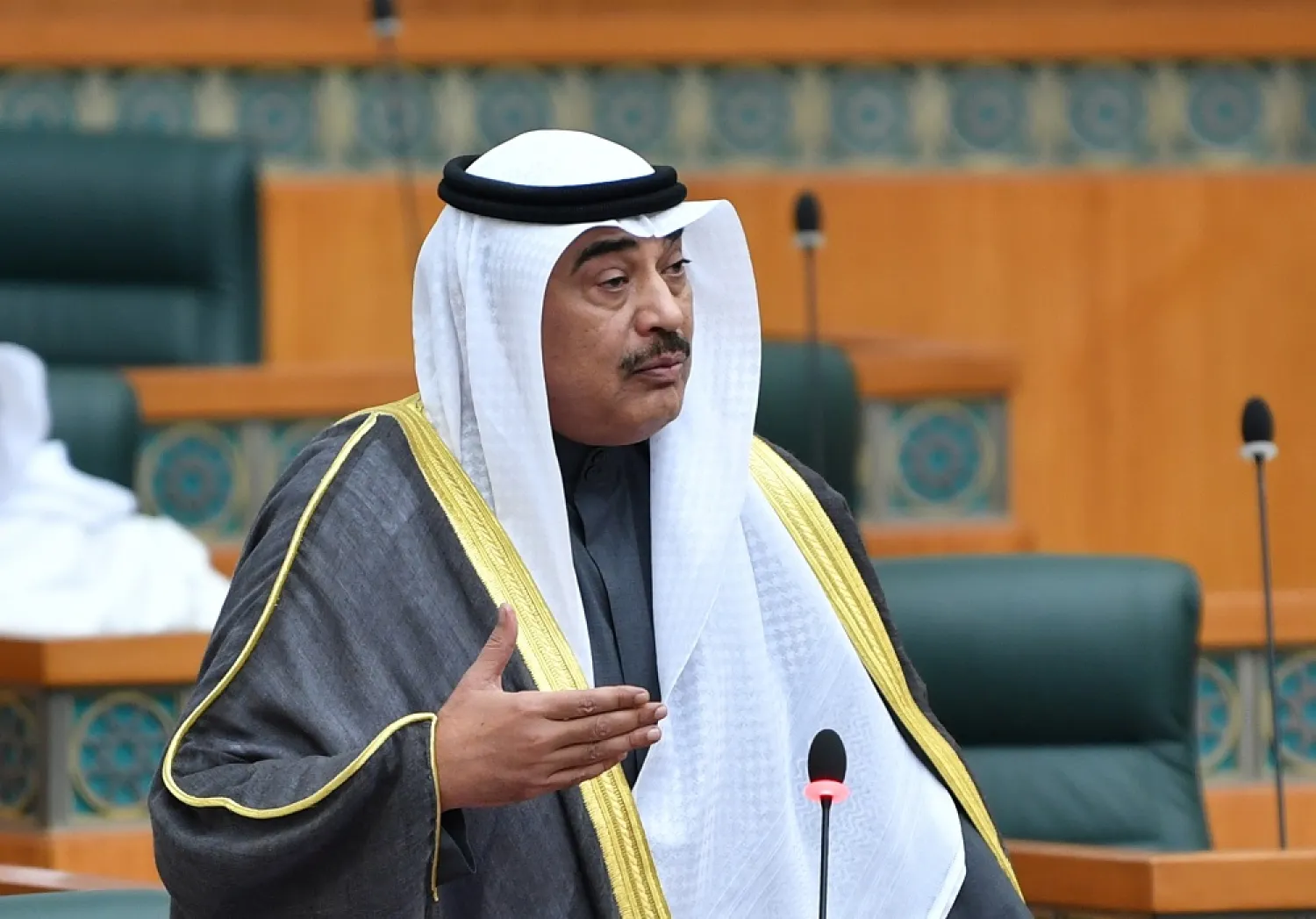 Prime Minister Sheikh Sabah al-Khalid speaks during a parliament private session to discuss the government procedures in case of any emergency due to the Russian-Ukrainian conflict, at the Kuwait National Assembly, Kuwait City, Kuwait on 07 March 2022. (EPA)