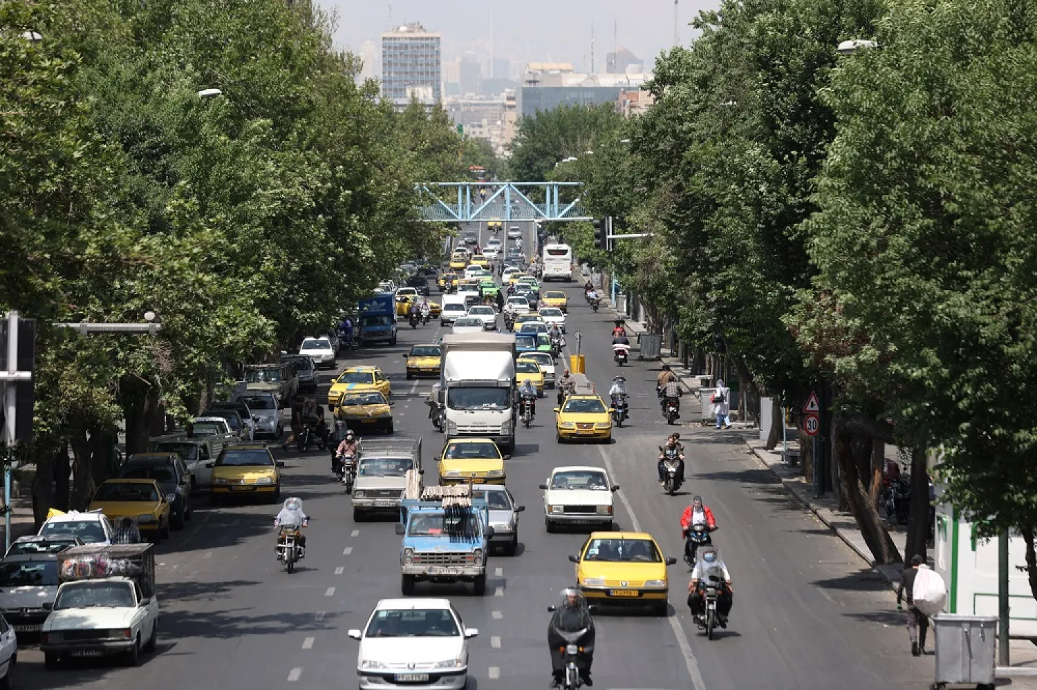 Cars drive along a street in Tehran, Iran May 1, 2022. (West Asia News Agency via Reuters)