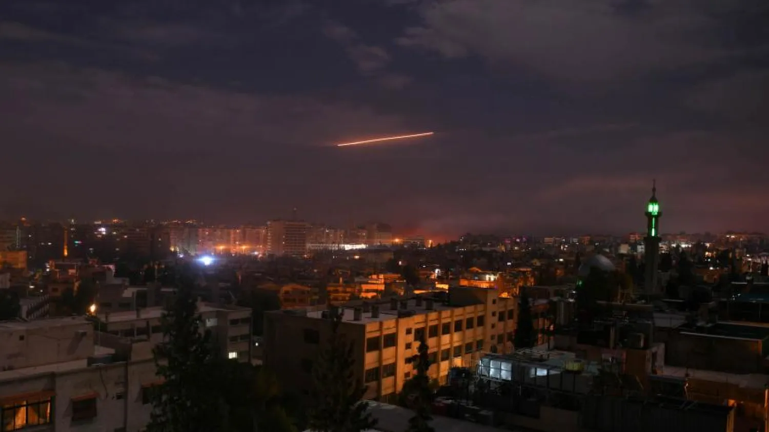 A picture taken early on Jan. 21, 2019, shows Syrian air defense batteries responding to what the Syrian state media said were Israeli missiles targeting Damascus. (AFP via Getty Images)
