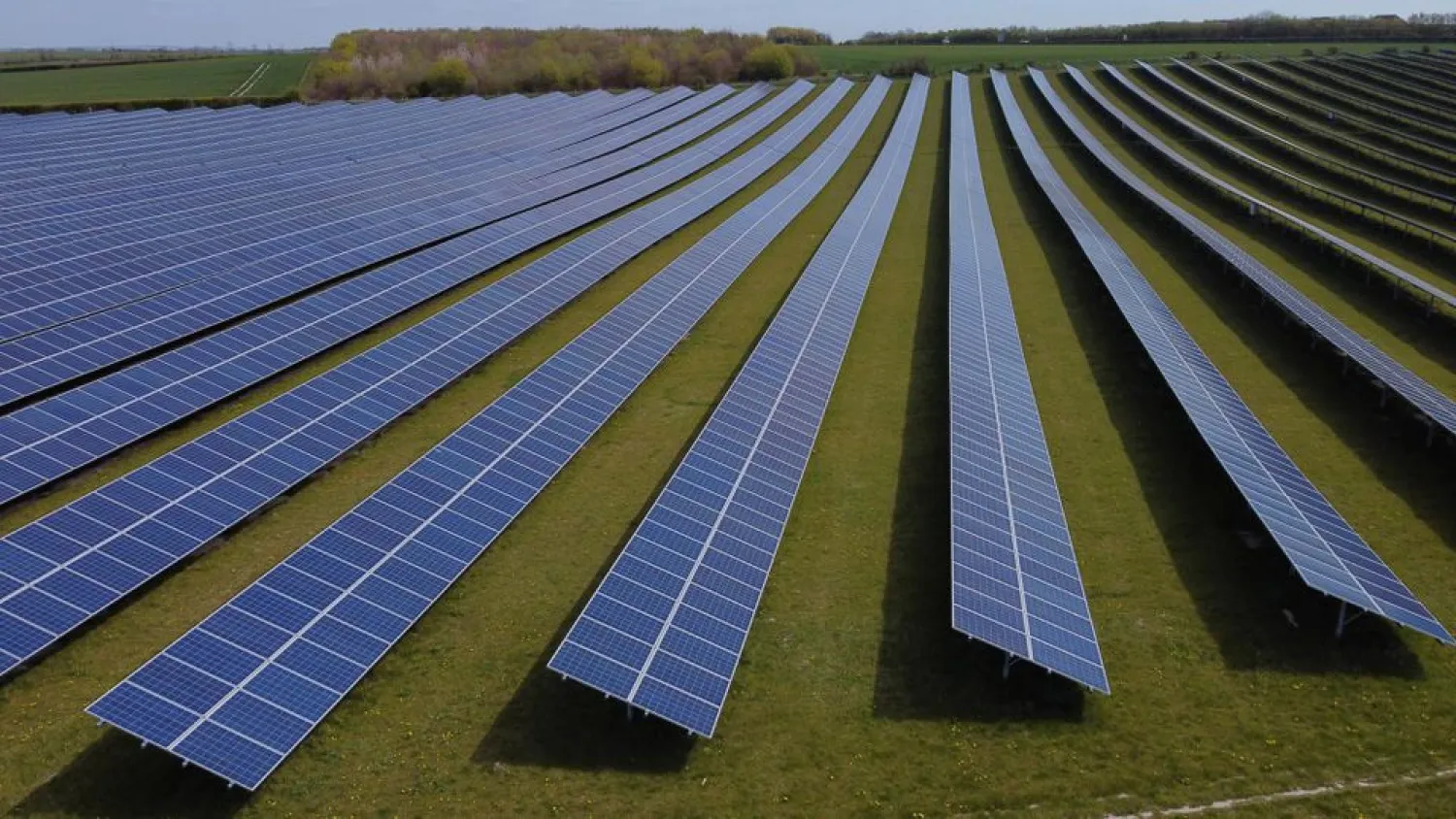 A field of solar panels is seen near Royston, Britain, April 26, 2021. REUTERS/Matthew Childs
