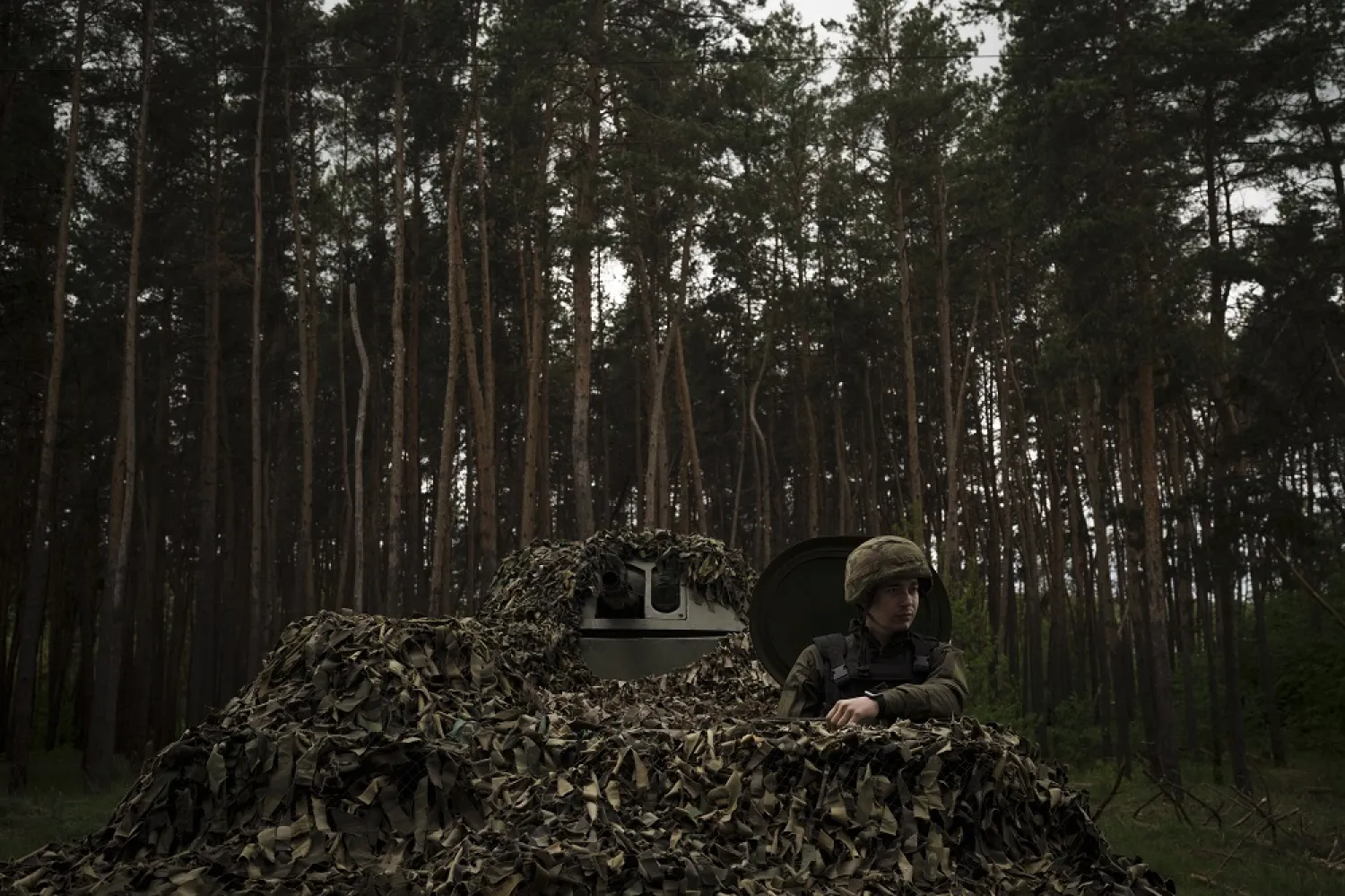 A Ukrainian National Guard soldier sits inside a tank at a position near Kharkiv, Ukraine, Monday, May 9, 2022. (AP)
