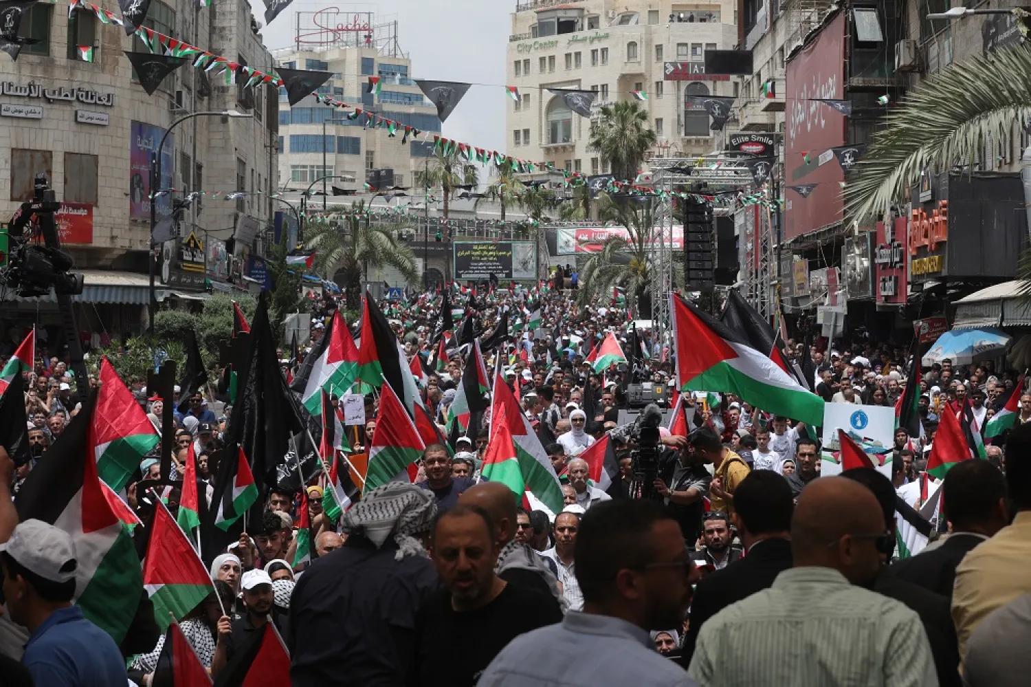 Palestinians participate in a rally marking the 74th anniversary of the Palestinian Nakba, in the West Bank city of Ramallah, 15 May 2022. (EPA)