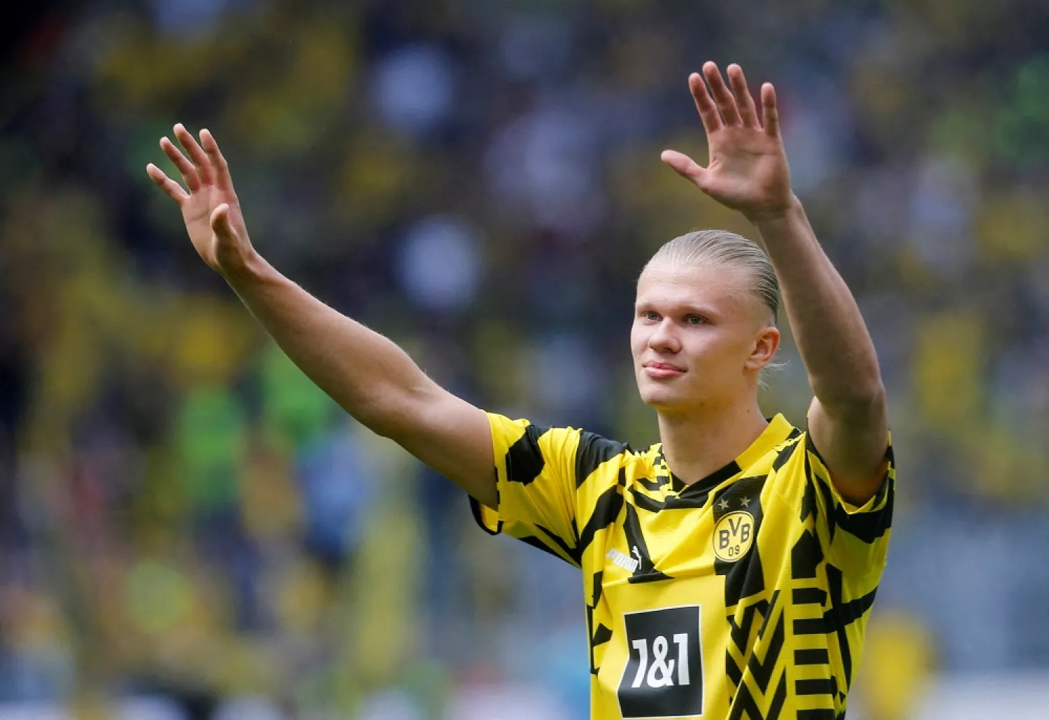 Football - Bundesliga - Borussia Dortmund vs. Hertha BSC - Signal Iduna Park, Dortmund, Germany - May 14, 2022 Borussia Dortmund's Erling Braut Haaland says goodbye to the fans before playing his last match. (Reuters)