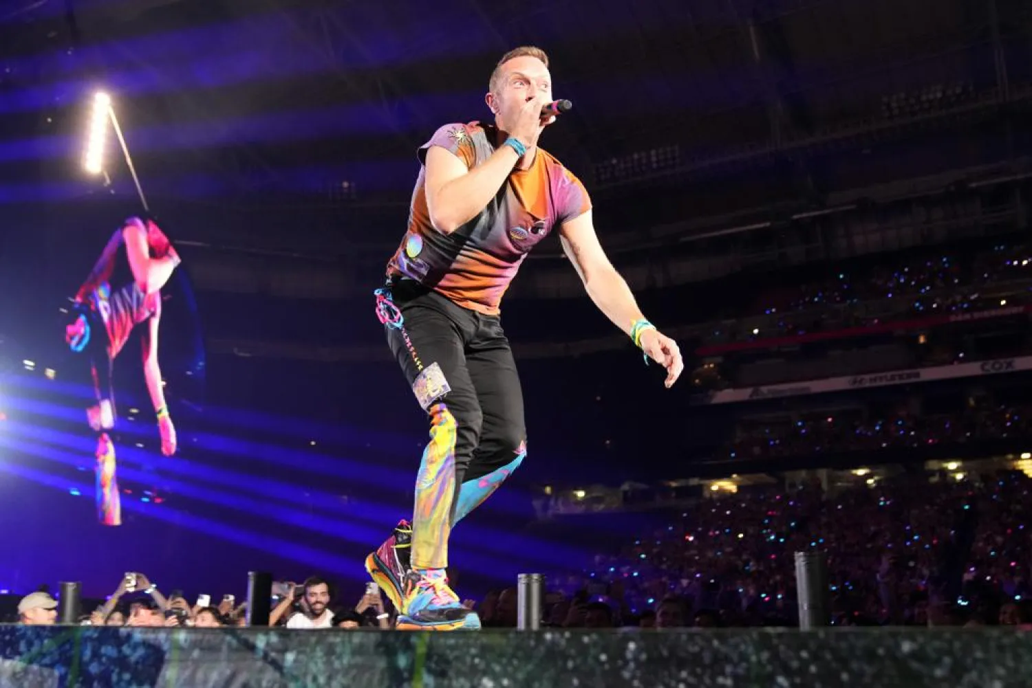 Chris Martin of Coldplay performs during the band's Music of the Spheres world tour on Thursday, May 12, 2022, at State Farm Stadium in Glendale, Ariz. (AP)